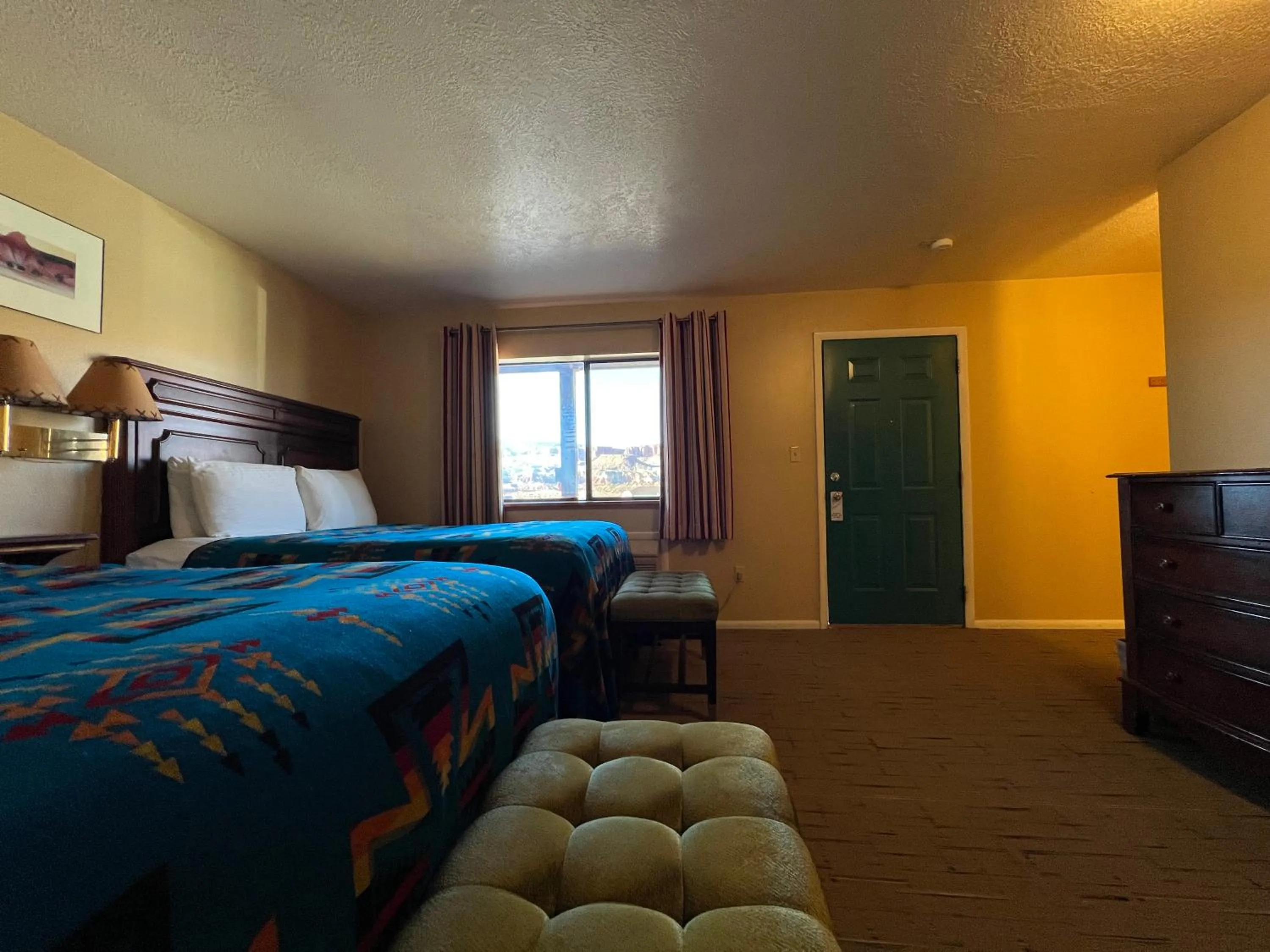 Bed in The Rim Rock Inn