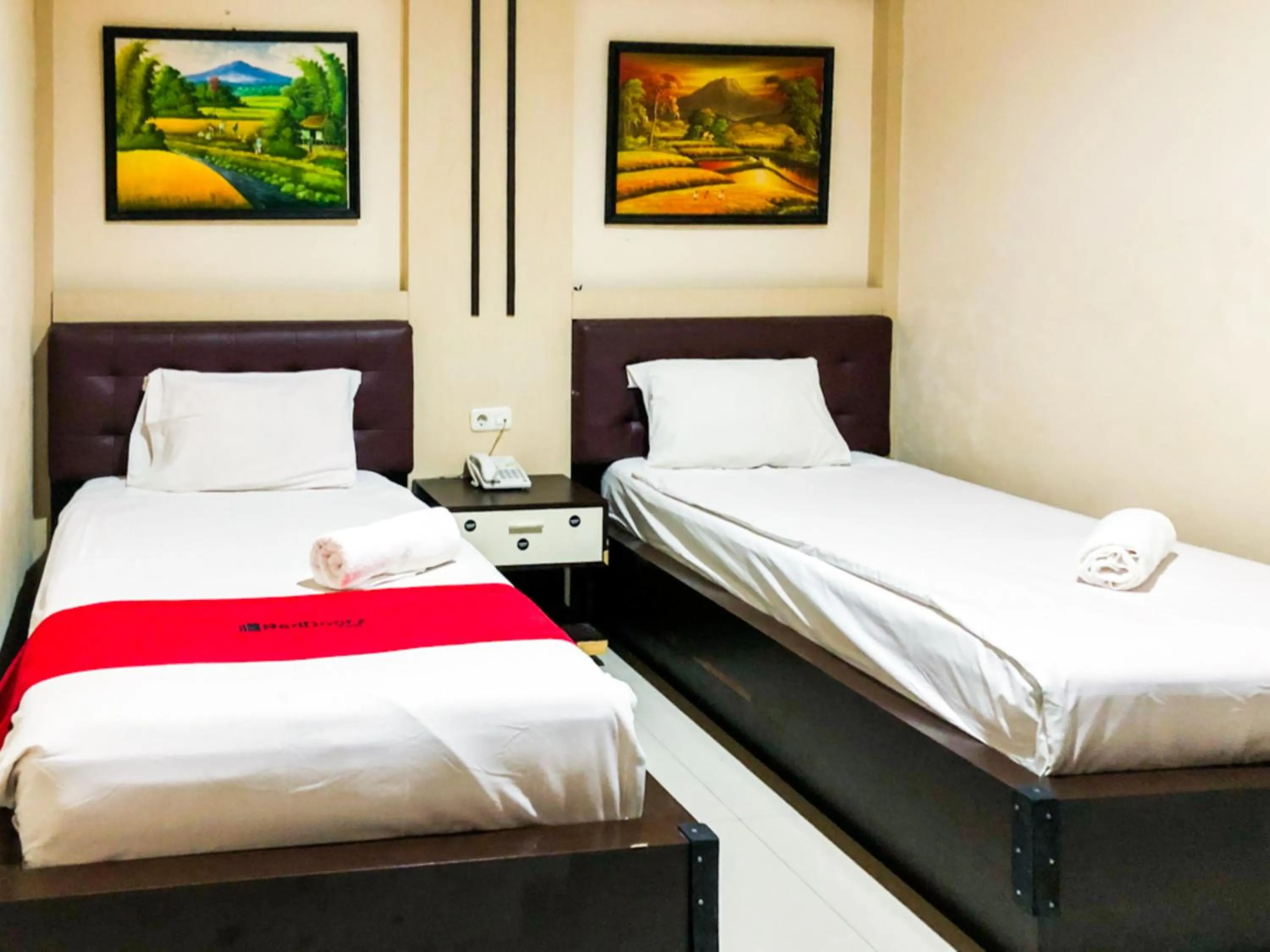 Bed in RedDoorz At Hotel Gajah Mada Palu