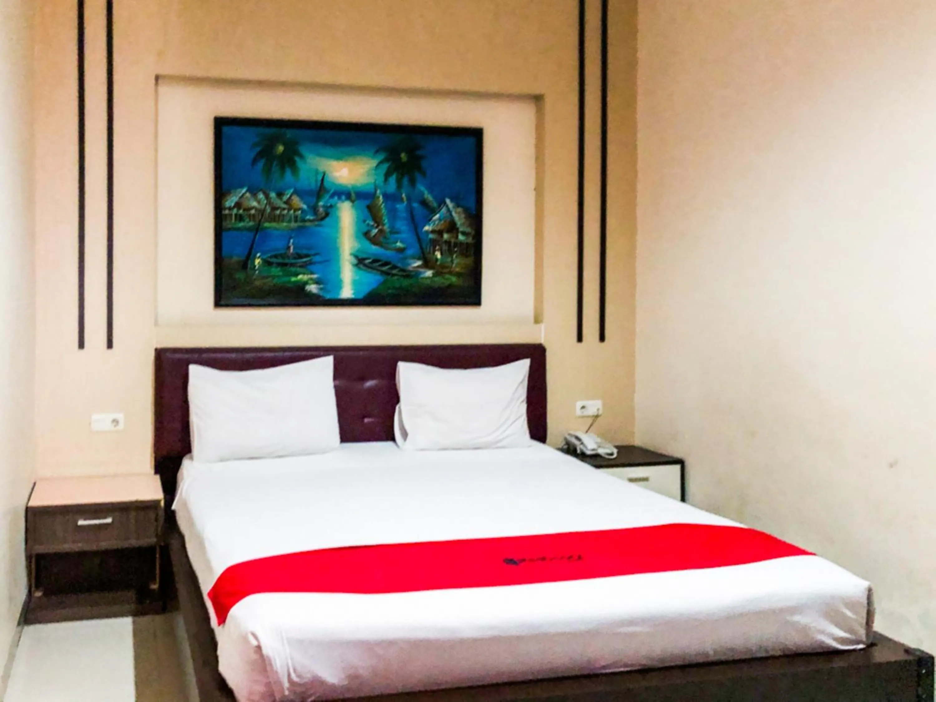 Bed in RedDoorz At Hotel Gajah Mada Palu