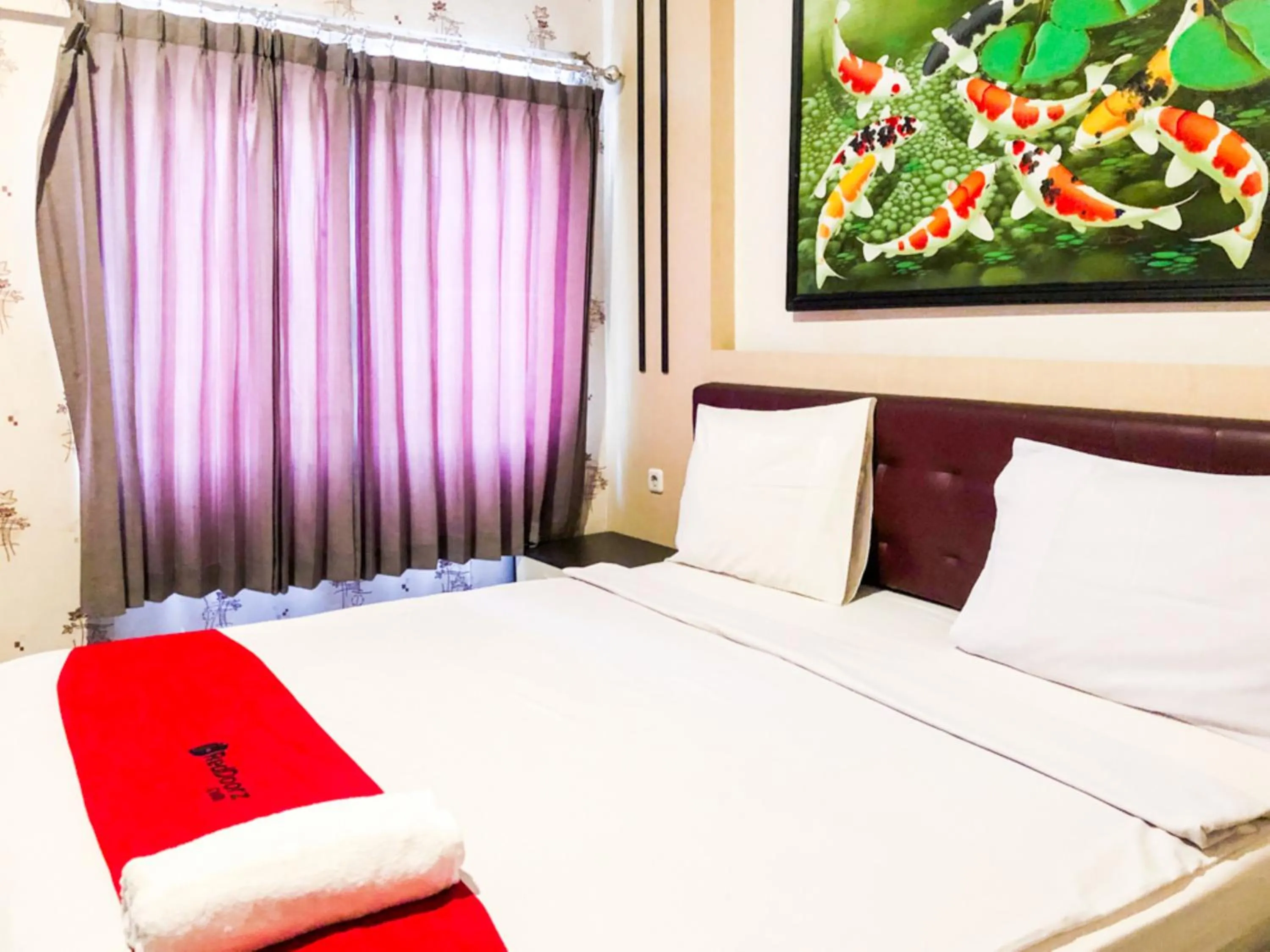 Bed in RedDoorz At Hotel Gajah Mada Palu