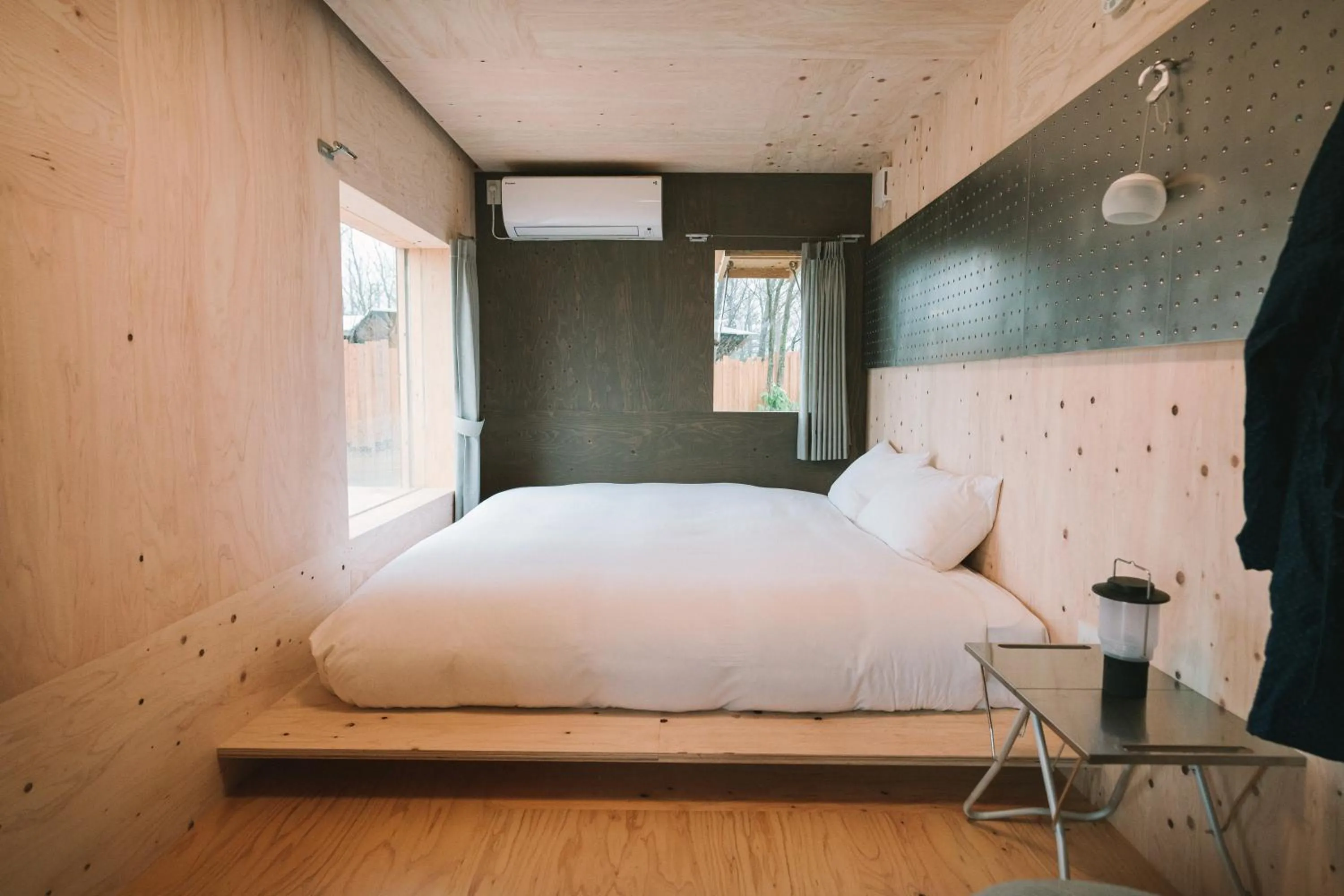 Bed in SNOW PEAK FIELD SUITE SPA HEADQUARTERS