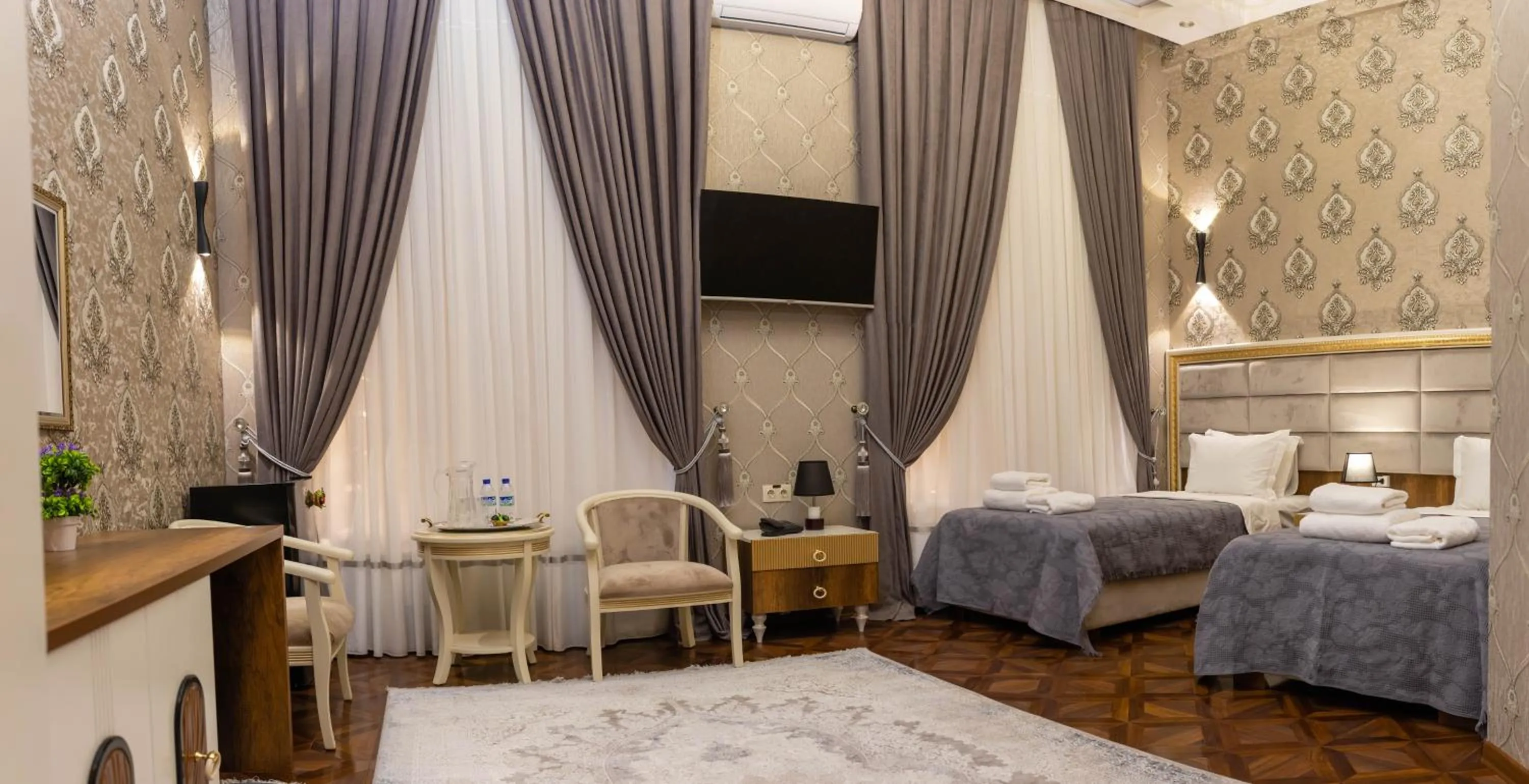 Photo of the whole room, Bed in Renaissance Boutique Hotel