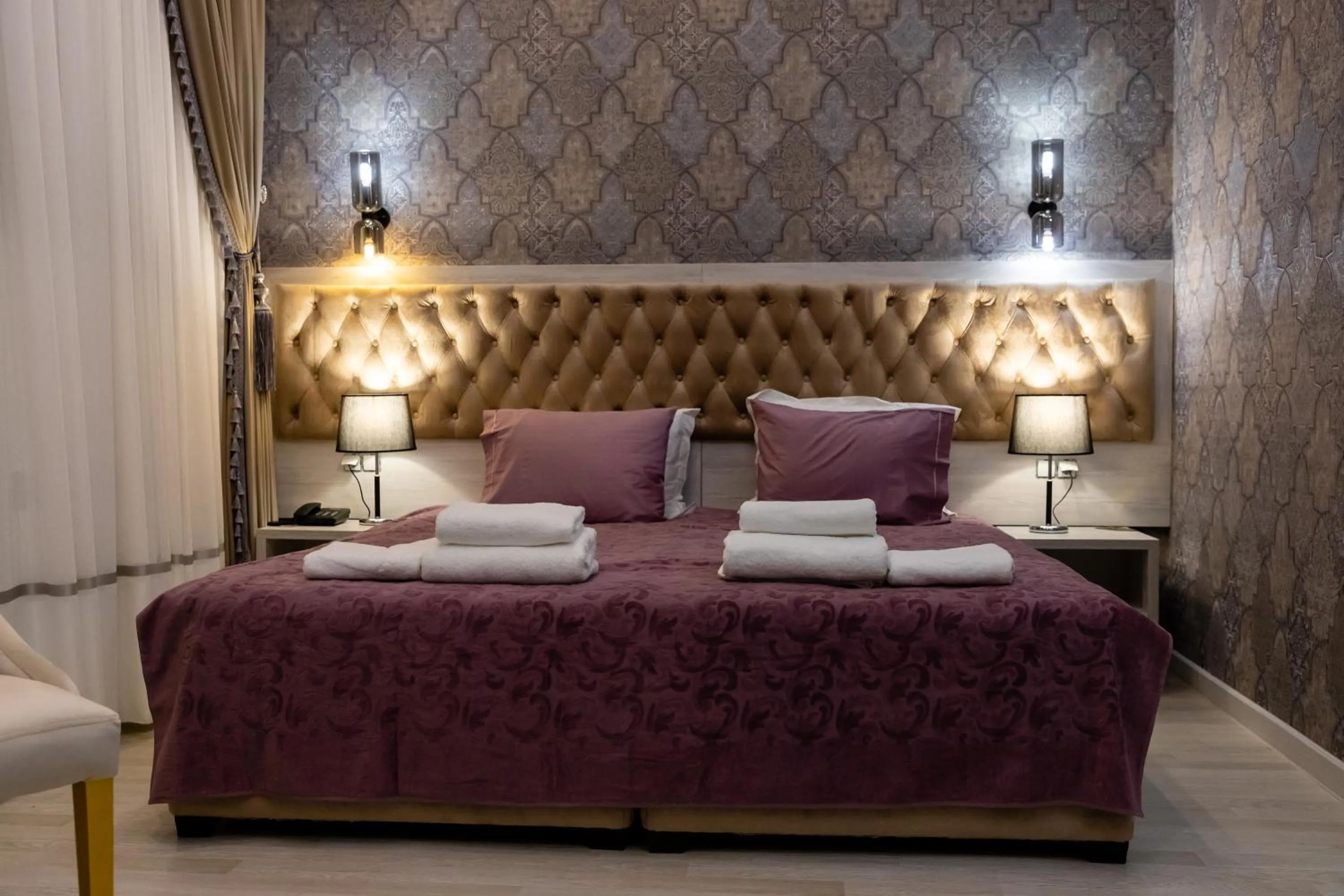 Photo of the whole room, Bed in Renaissance Boutique Hotel