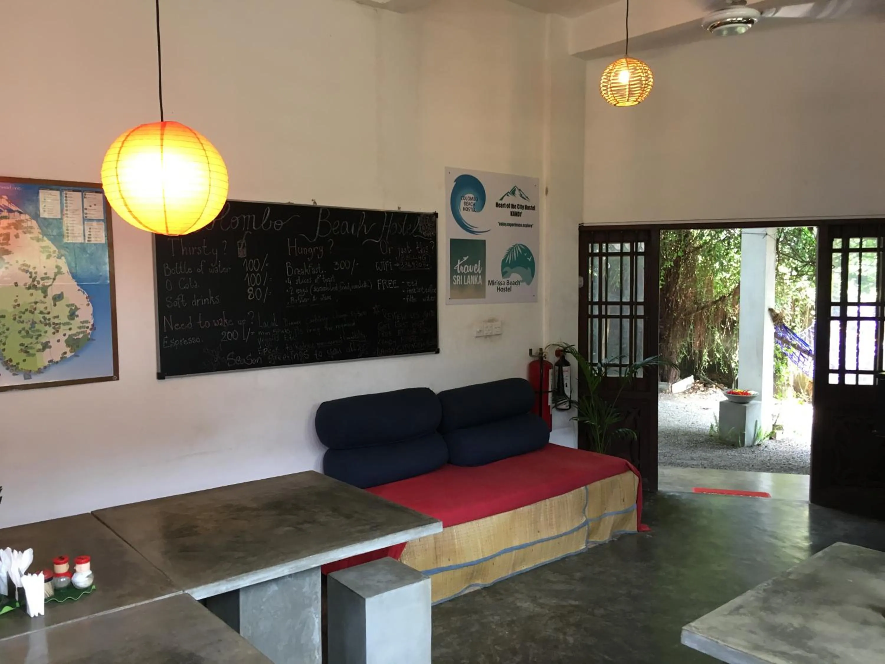 Communal lounge/ TV room in Colombo Beach Hostel