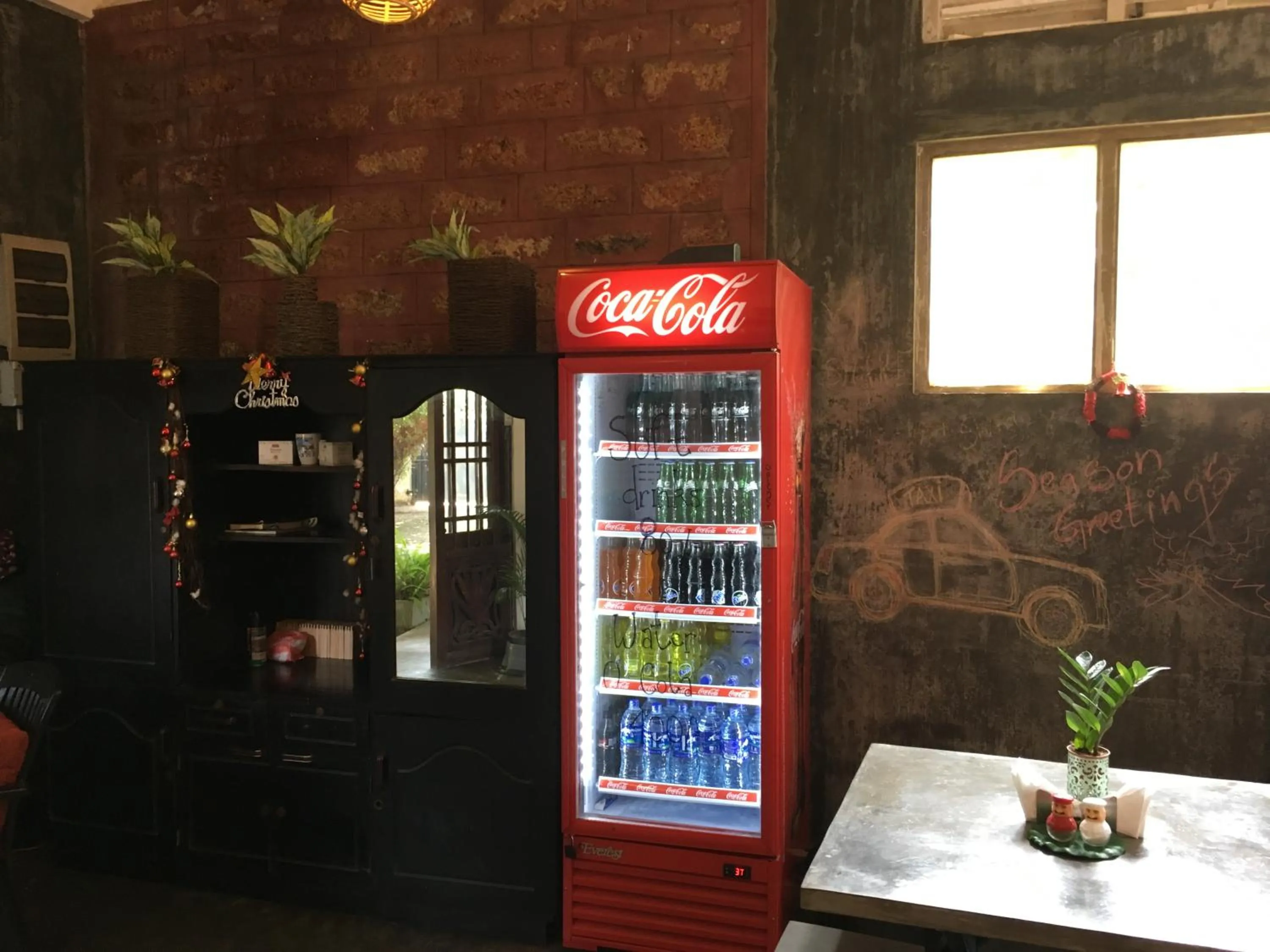 Communal lounge/ TV room in Colombo Beach Hostel