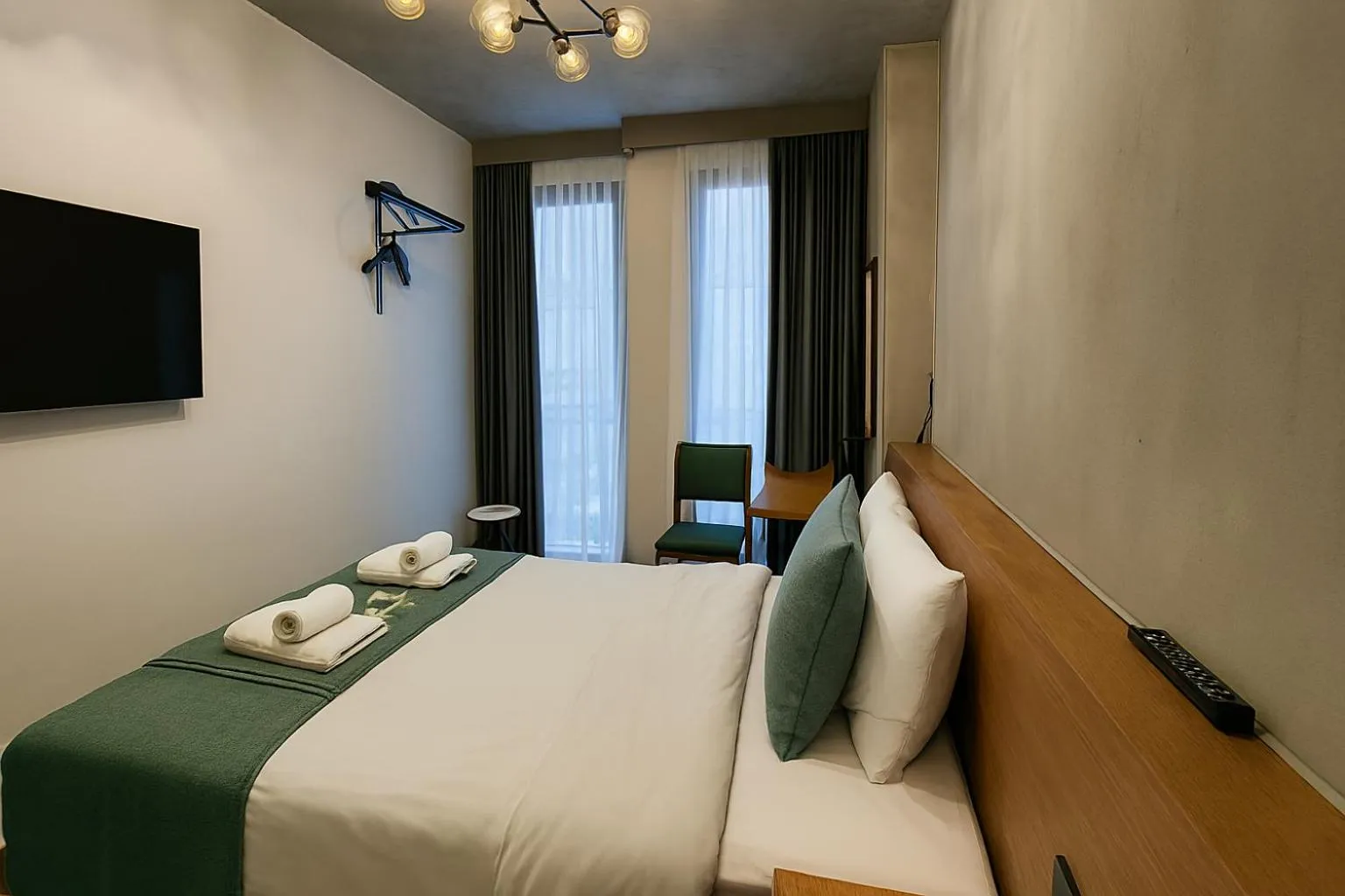 Bed in Aleksandr Pera Hotel