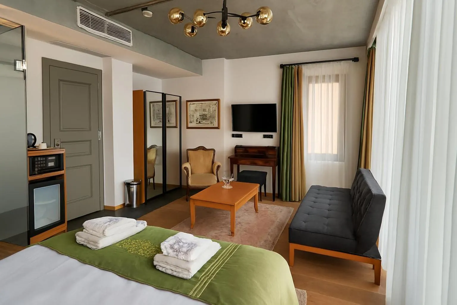 Bed in Aleksandr Pera Hotel