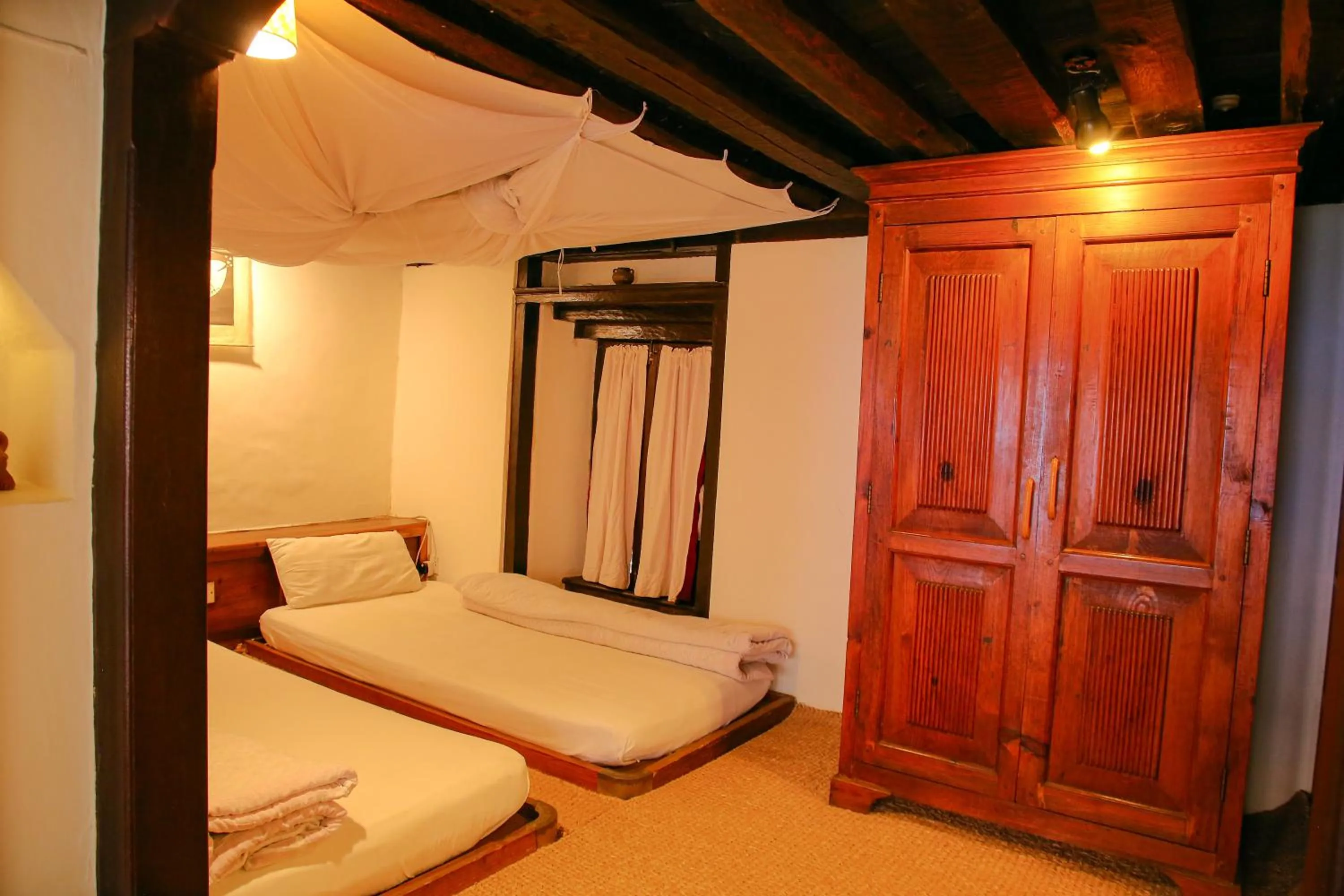 Bed in Newa Chen Historic House UNESCO