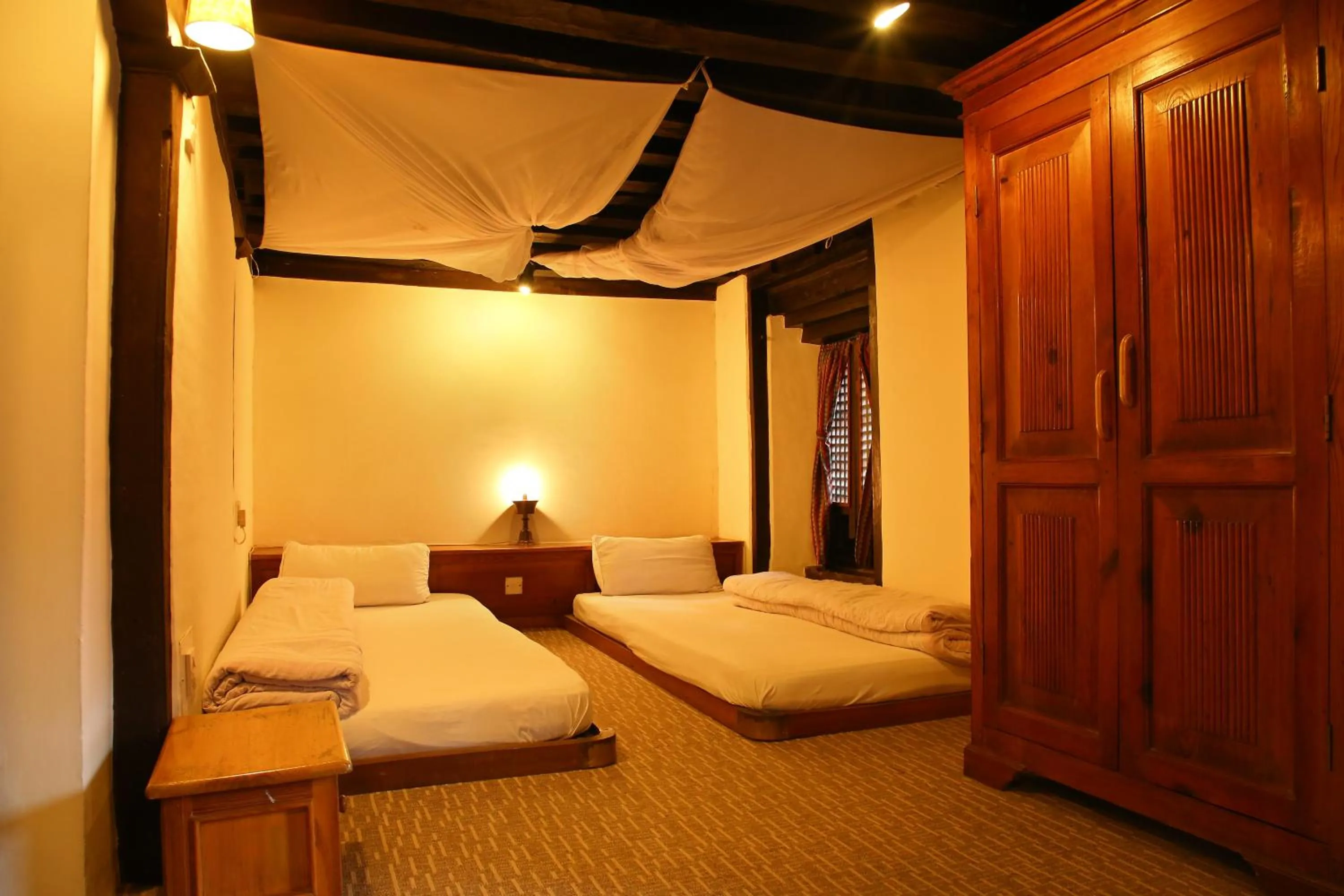 Bed in Newa Chen Historic House UNESCO