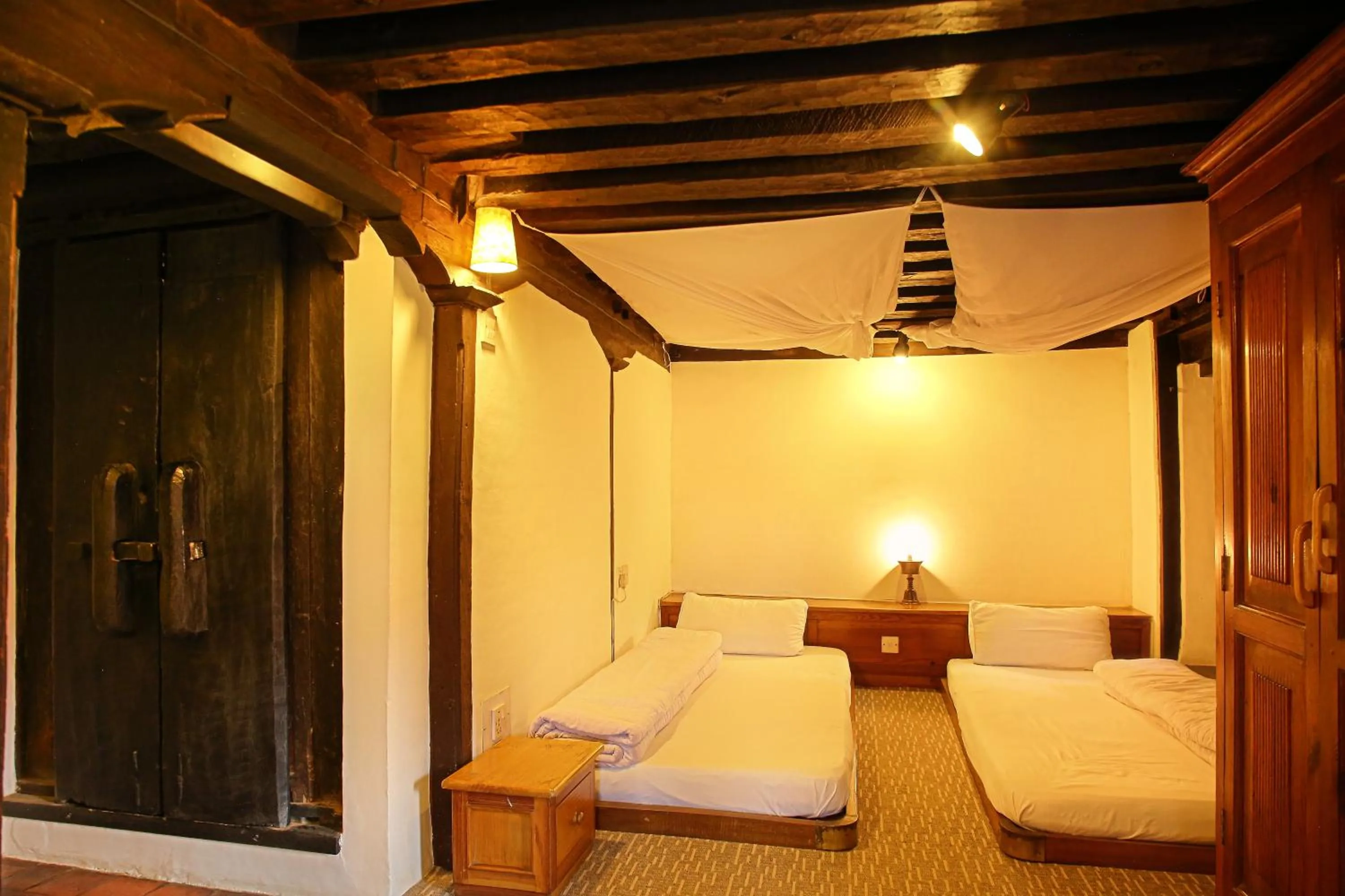 Bed in Newa Chen Historic House UNESCO