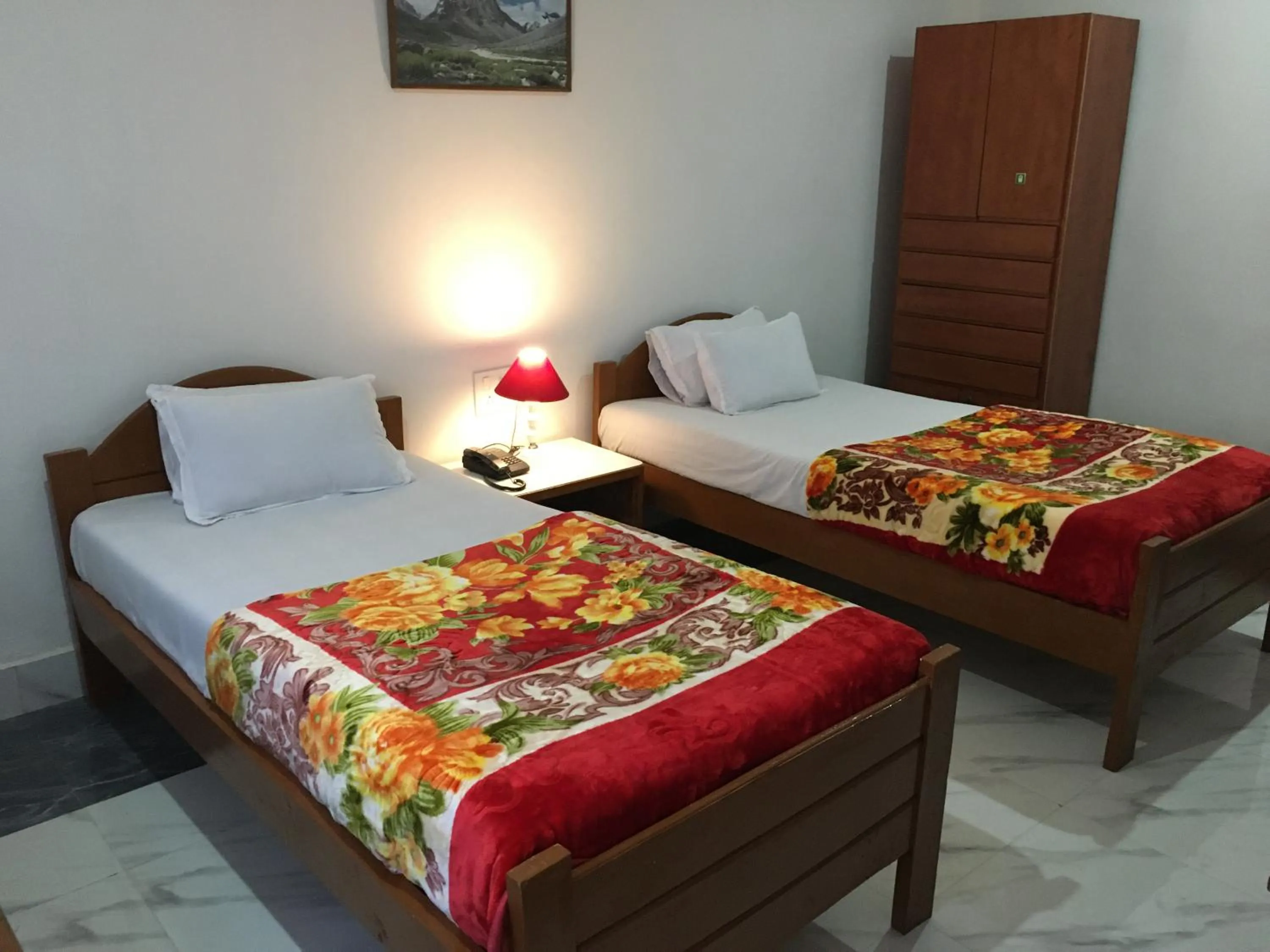 Bed in HOTEL BODHGAYA INN