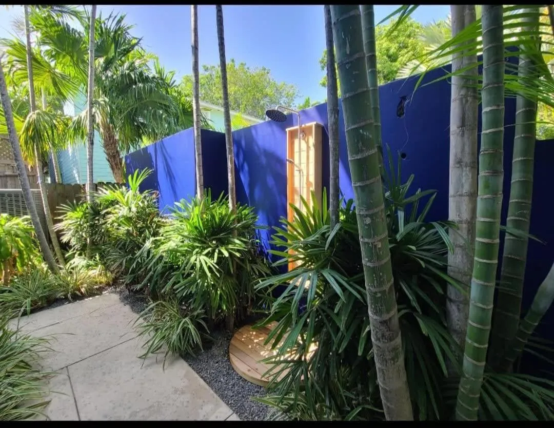 Shower in Four Suites on Duval Street w parking and pool