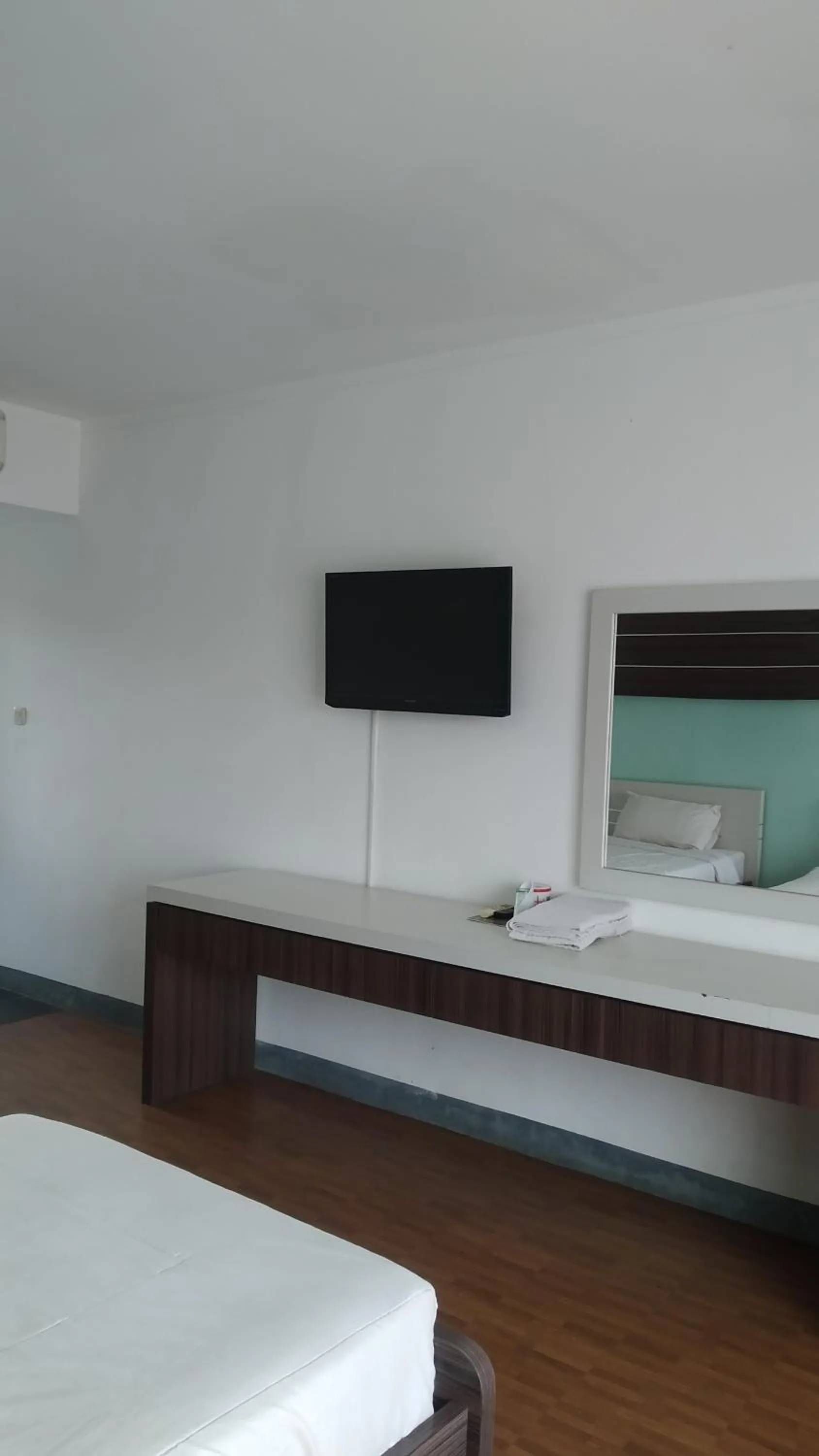 Bed in PUNCAK VILLAGE HOTEL & KAMPUNG MAIN ANAK