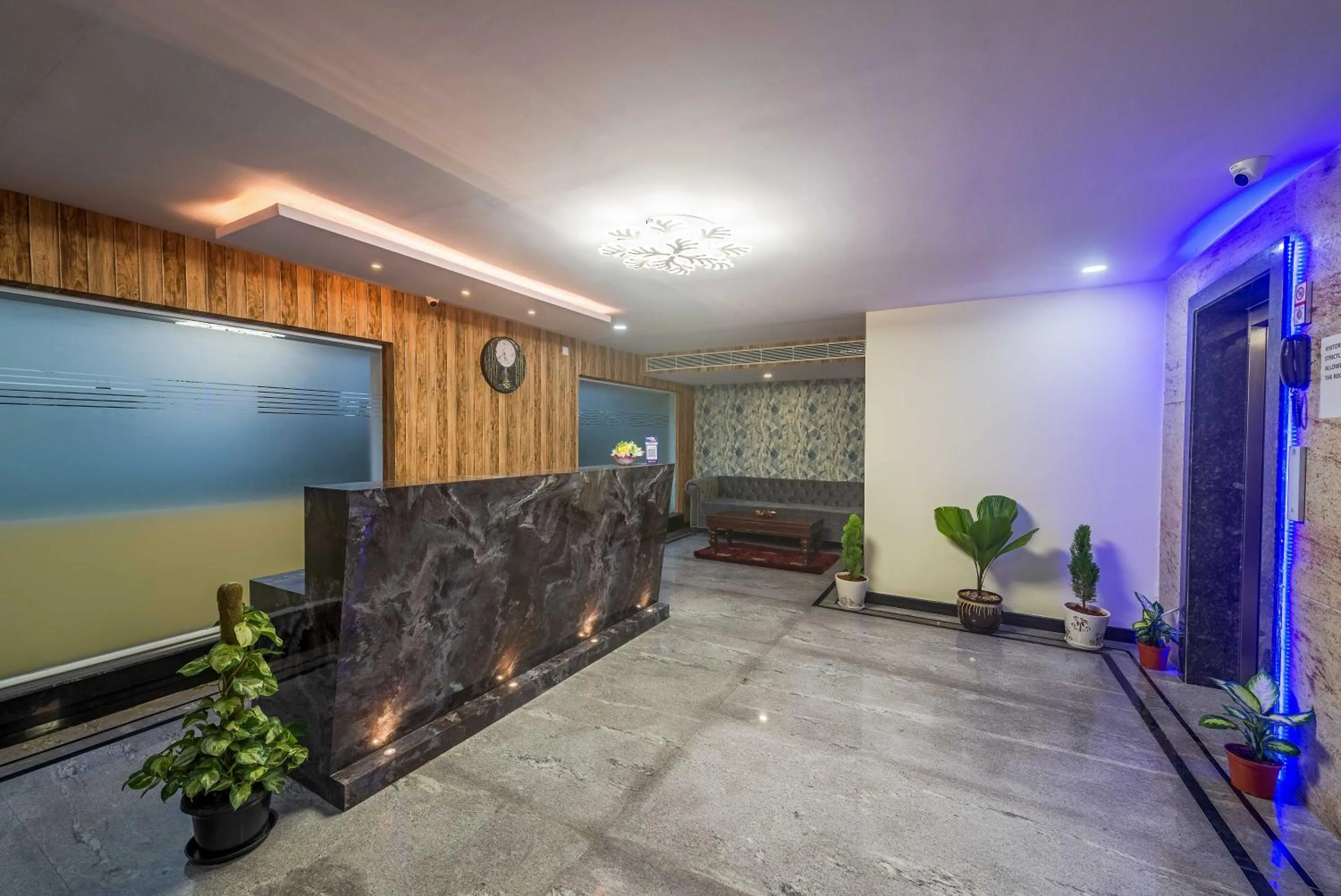 Communal lounge/ TV room in Zenith Hotels Hebbal Bangalore