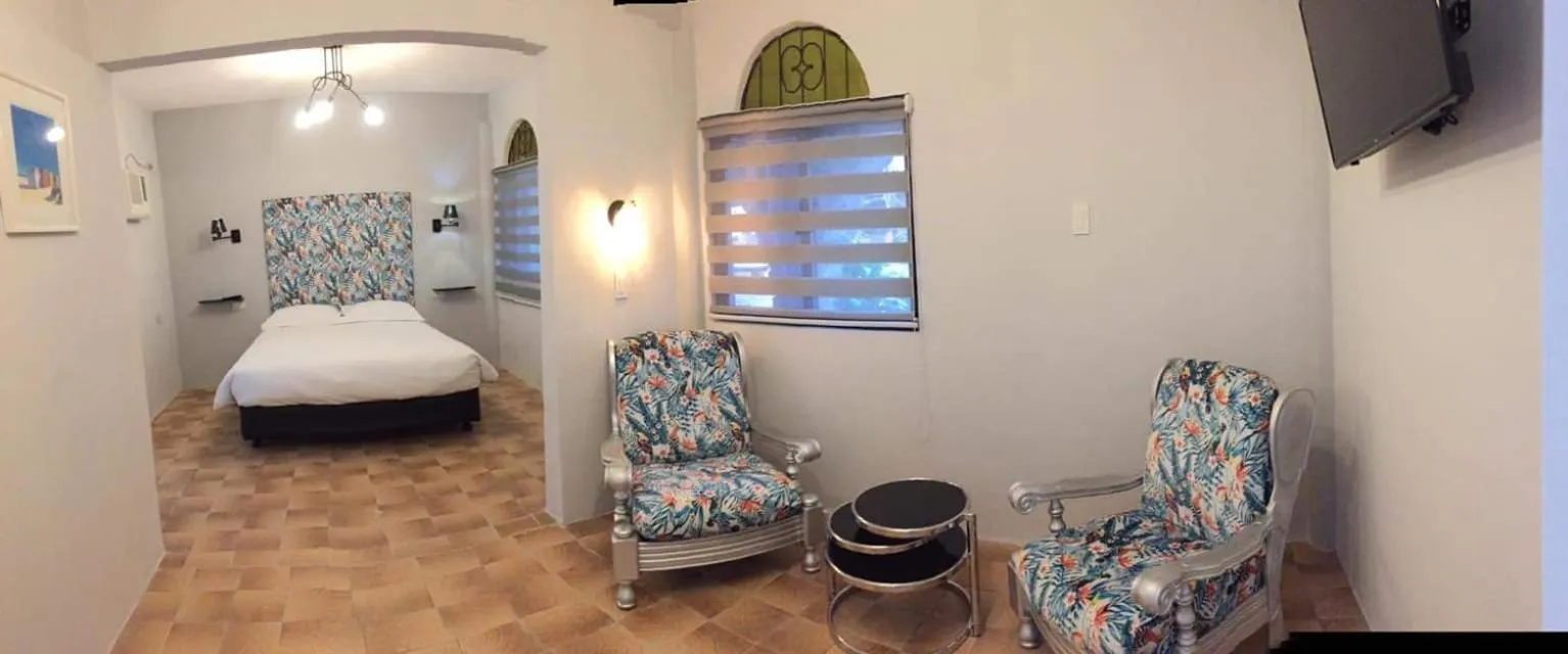 Bed in Sunbloom Beachfront Hotel and Restaurant Zambales