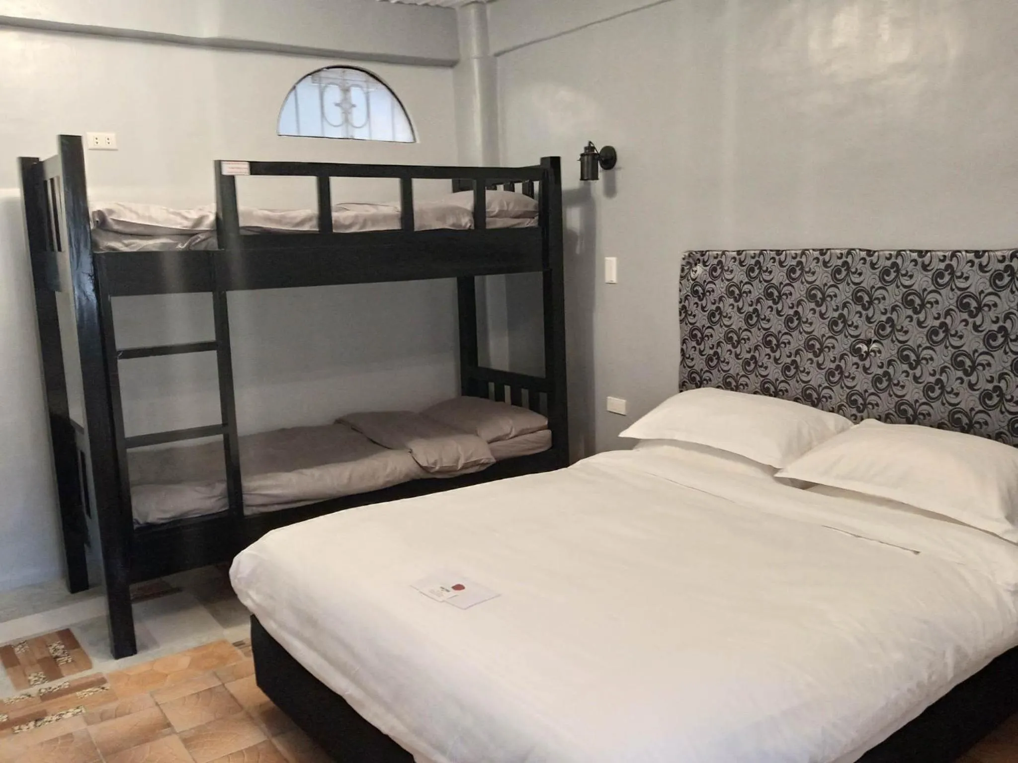 Bed in Sunbloom Beachfront Hotel and Restaurant Zambales