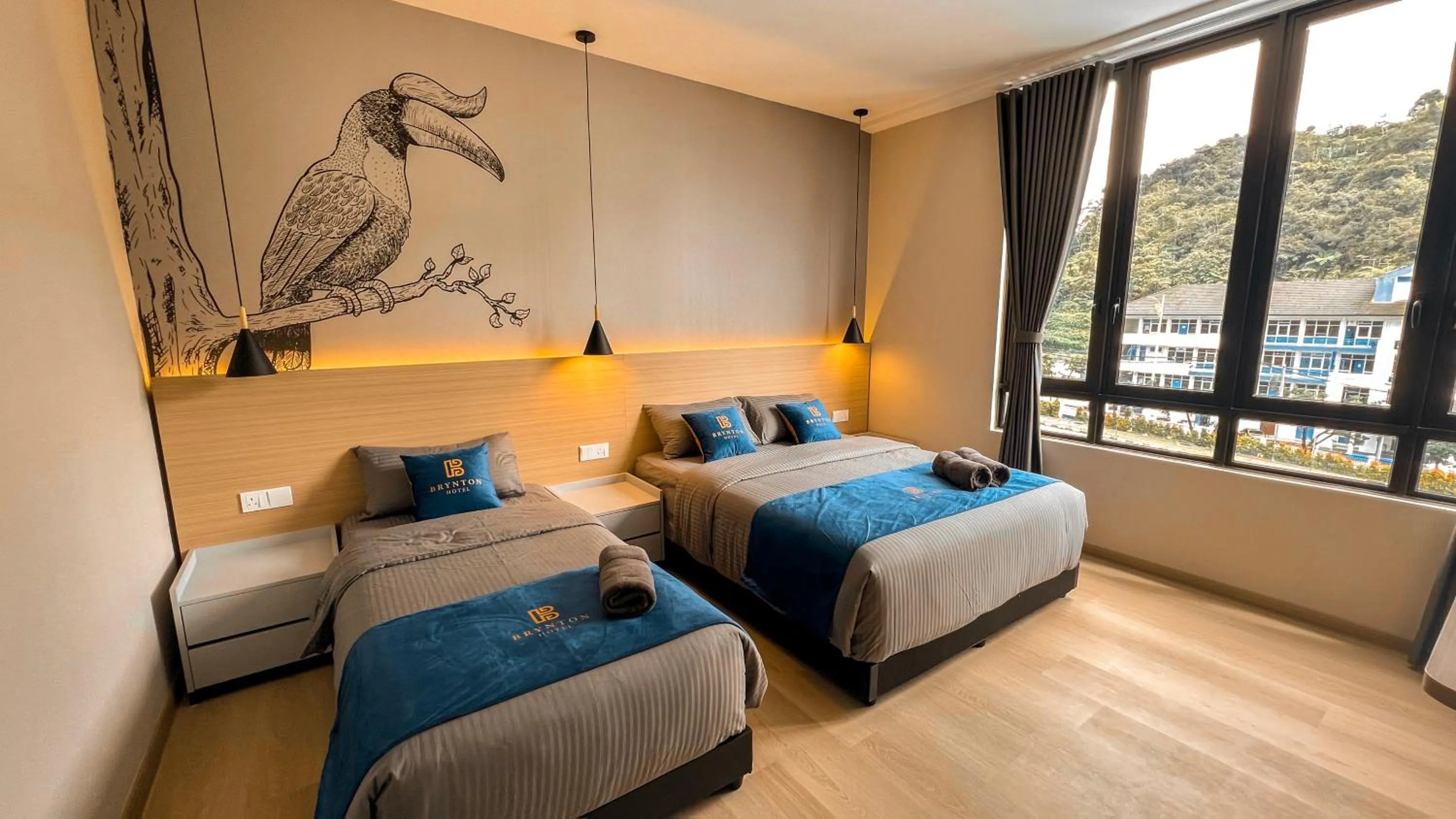 Bed in Hotel Brynton at Cameron Centrum Mall