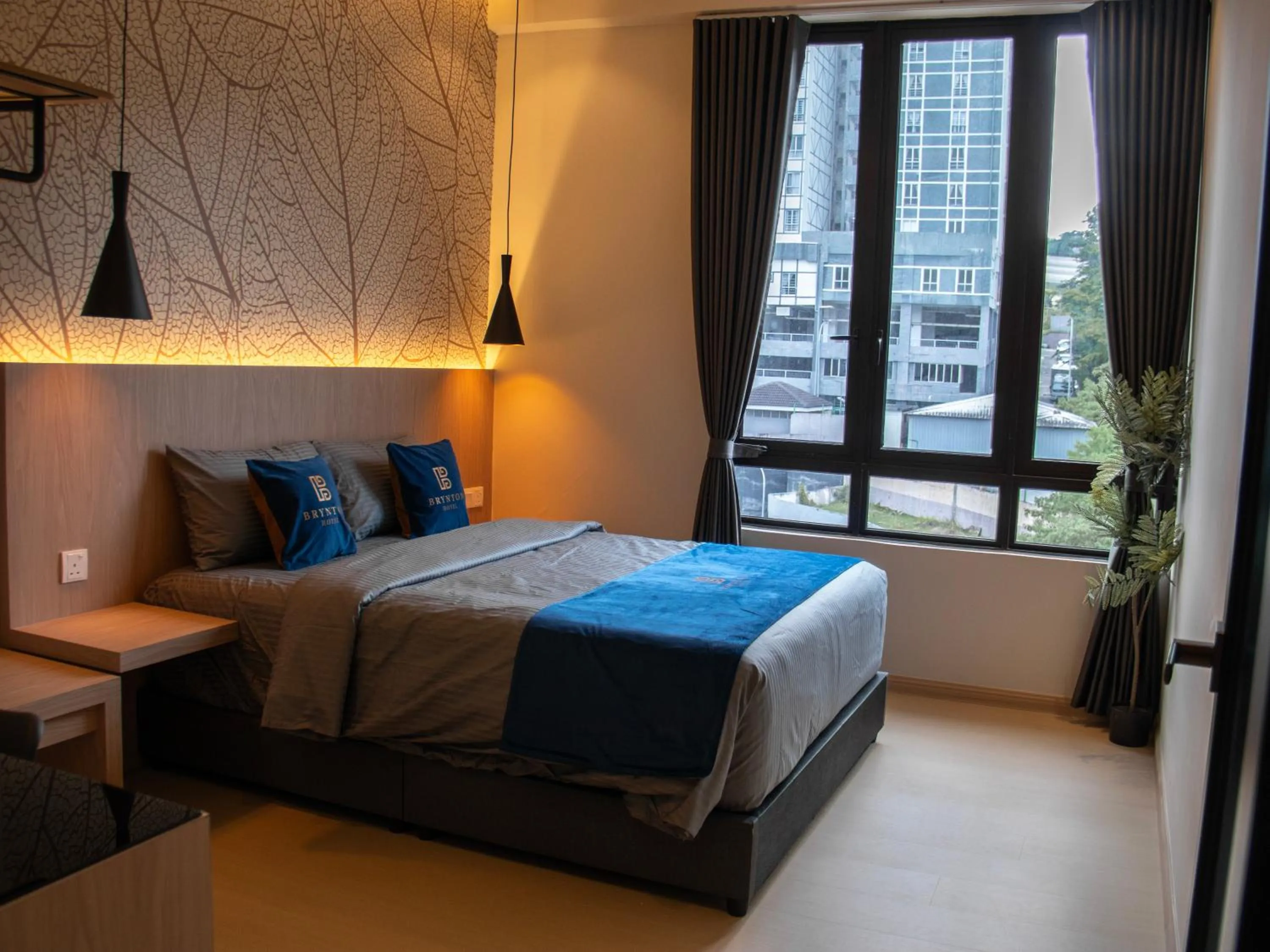 Bedroom, Bed in Hotel Brynton at Cameron Centrum Mall