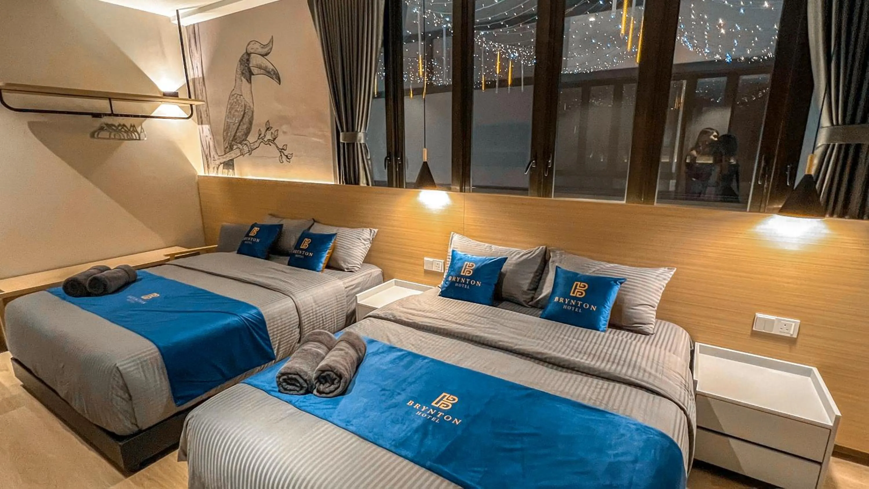 Bed in Hotel Brynton at Cameron Centrum Mall