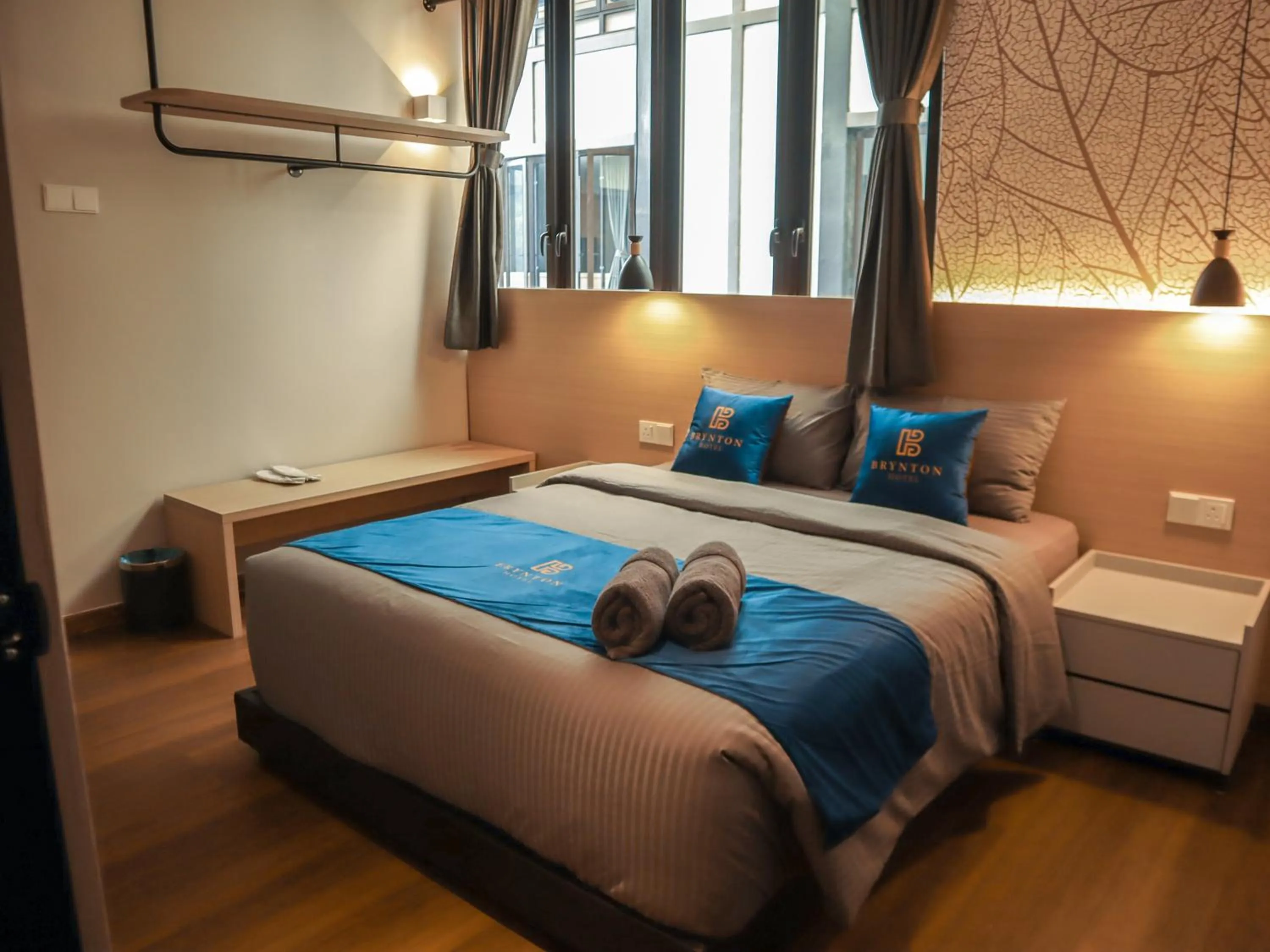 Bed in Hotel Brynton at Cameron Centrum Mall