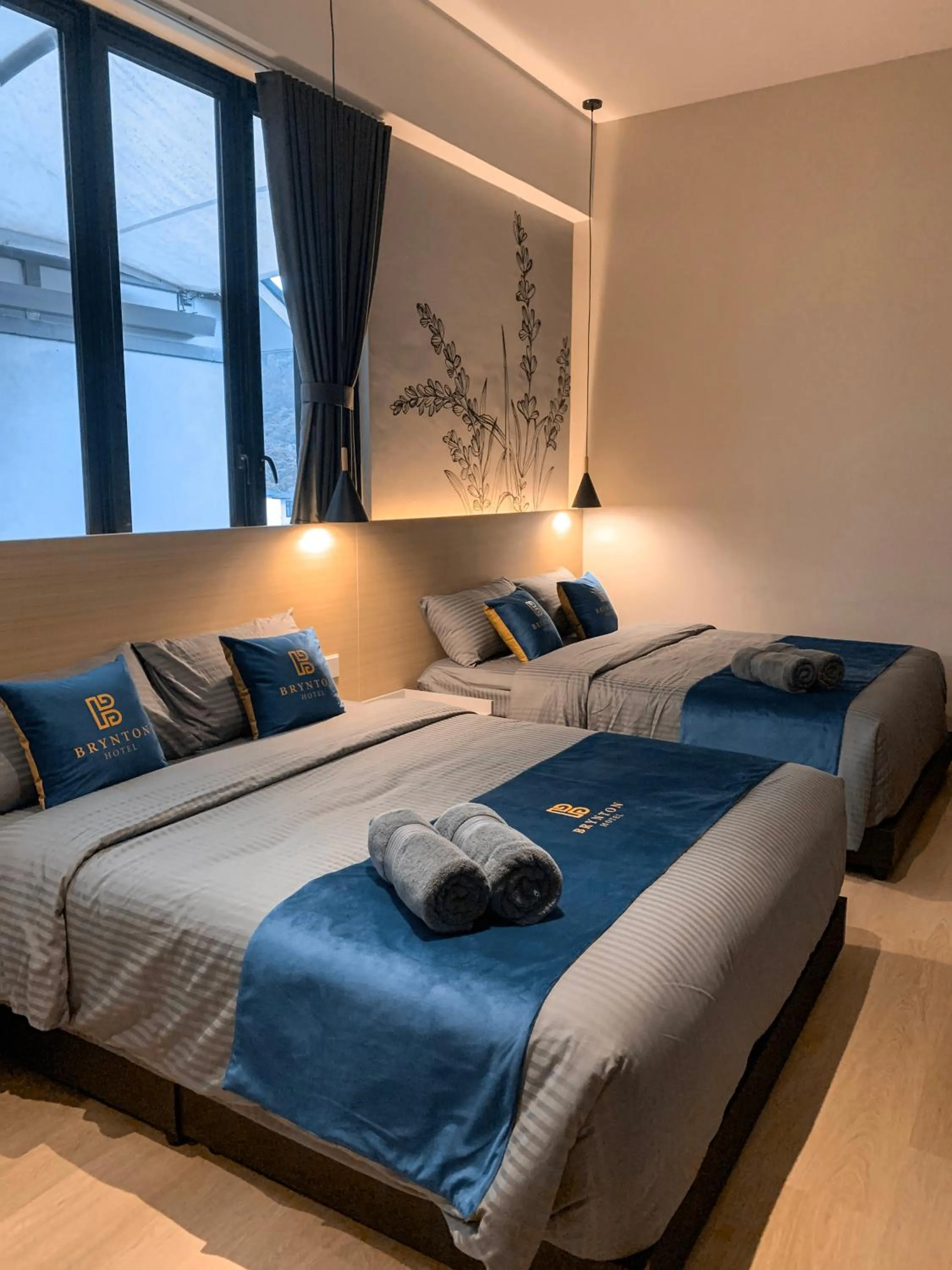 Bed in Hotel Brynton at Cameron Centrum Mall