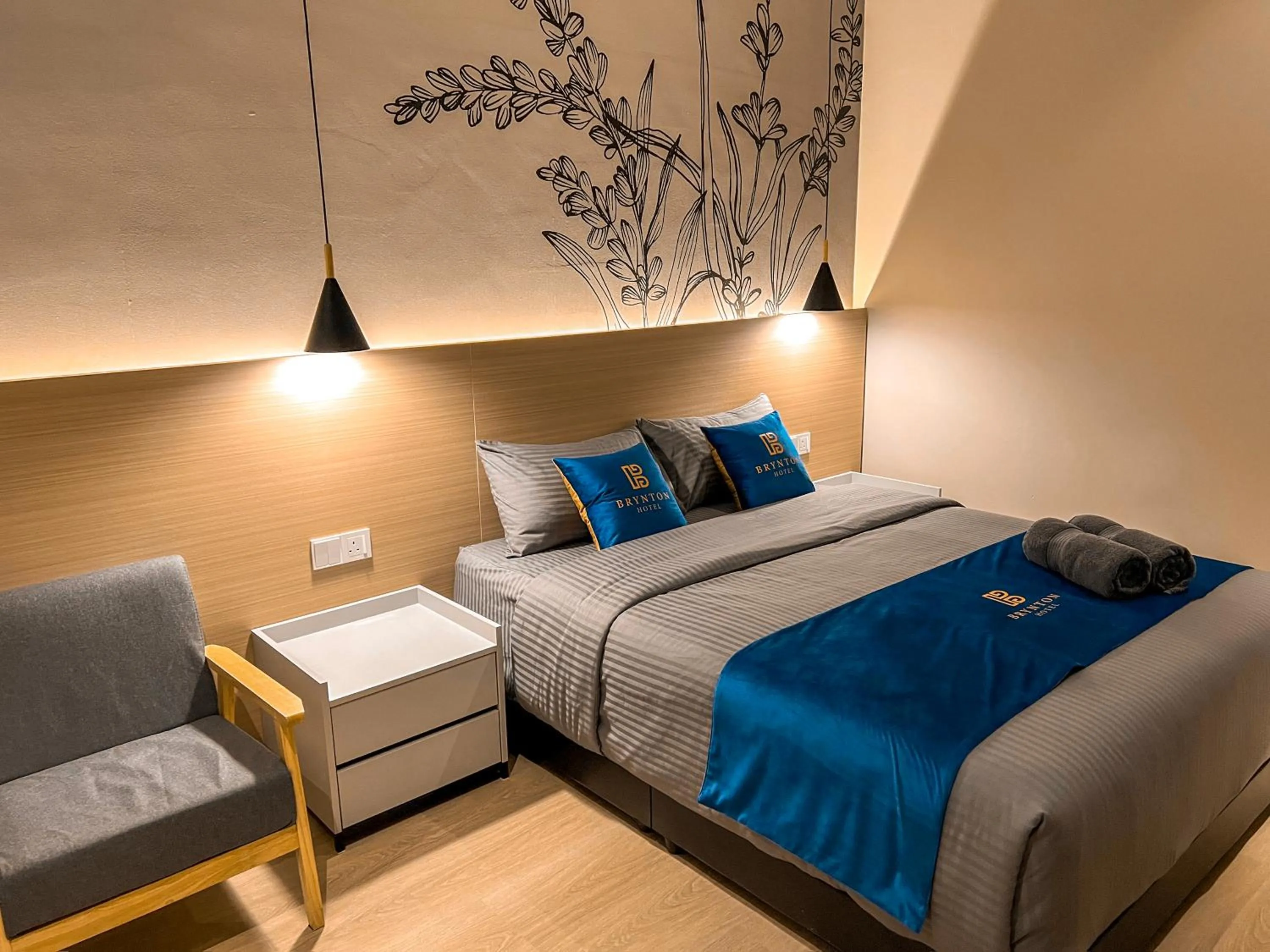 Bed in Hotel Brynton at Cameron Centrum Mall