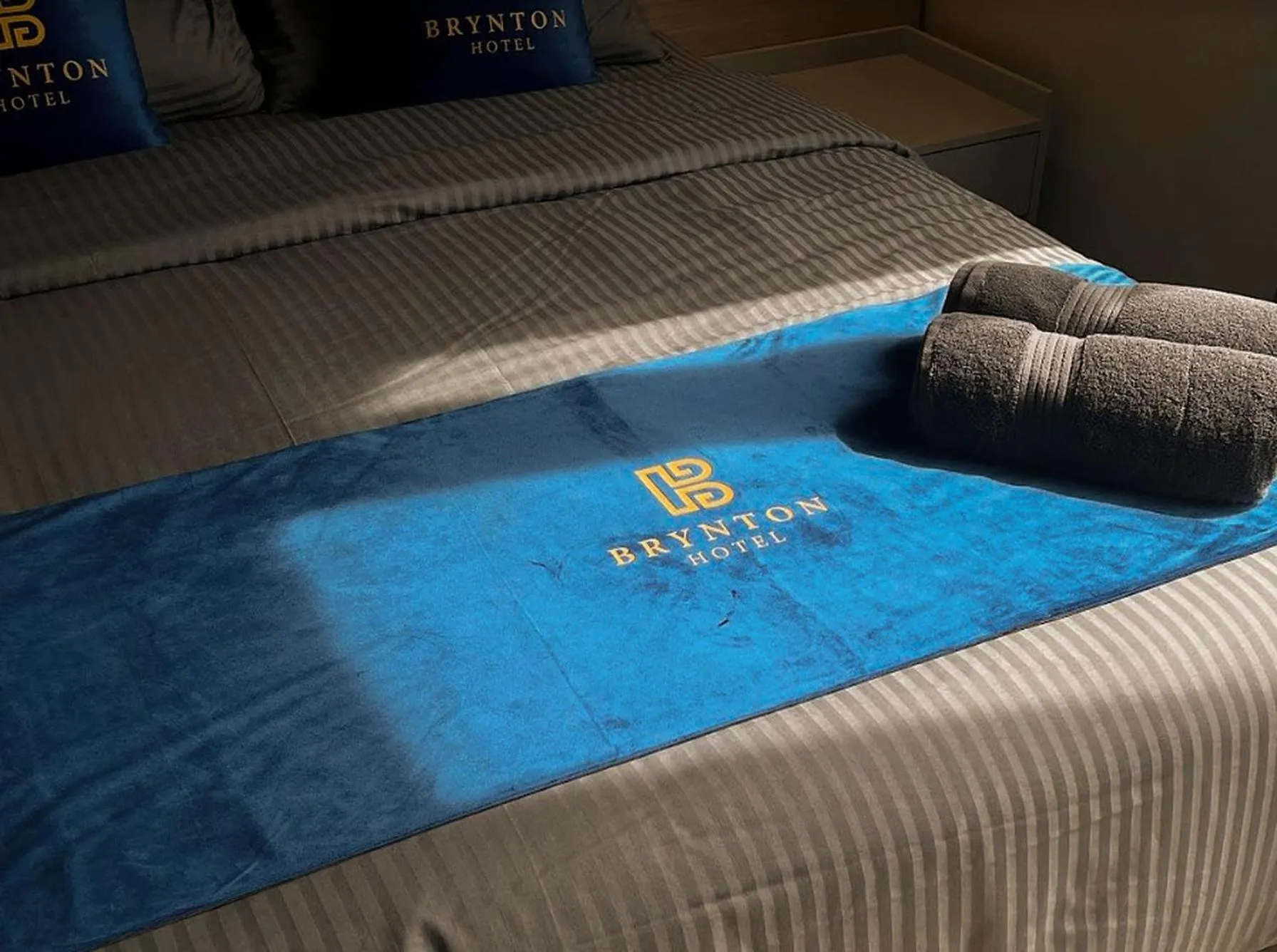 Bed in Hotel Brynton at Cameron Centrum Mall