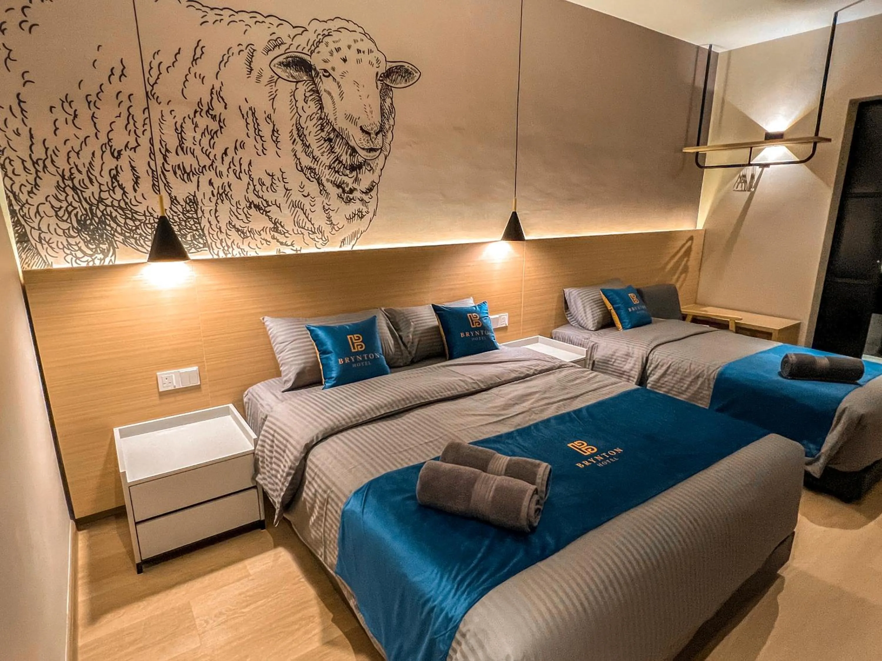 Bed in Hotel Brynton at Cameron Centrum Mall