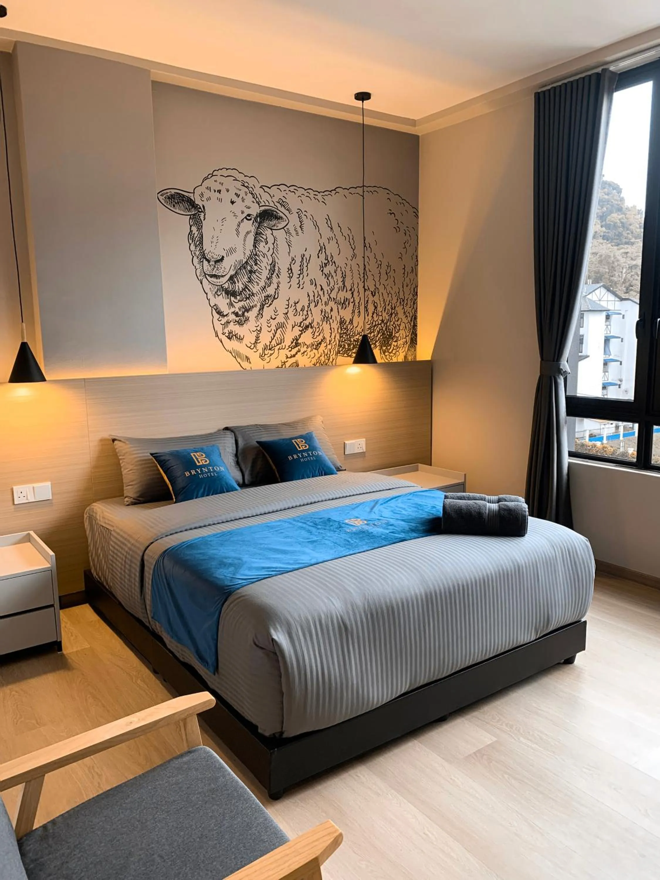 Bed in Hotel Brynton at Cameron Centrum Mall