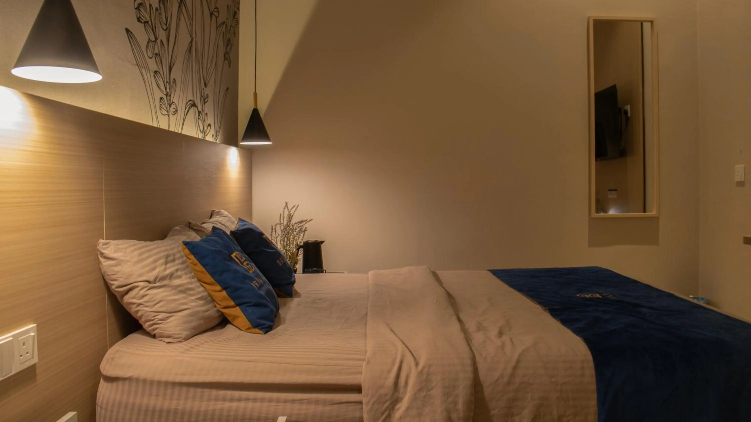 Bed in Hotel Brynton at Cameron Centrum Mall