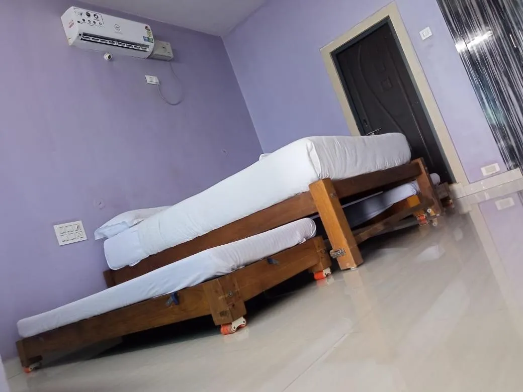 Bed in Poornima Beach Stay