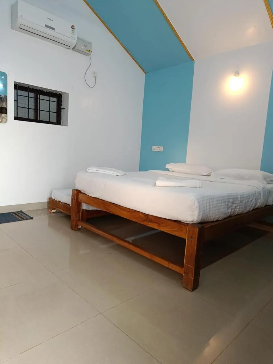 Bed in Poornima Beach Stay