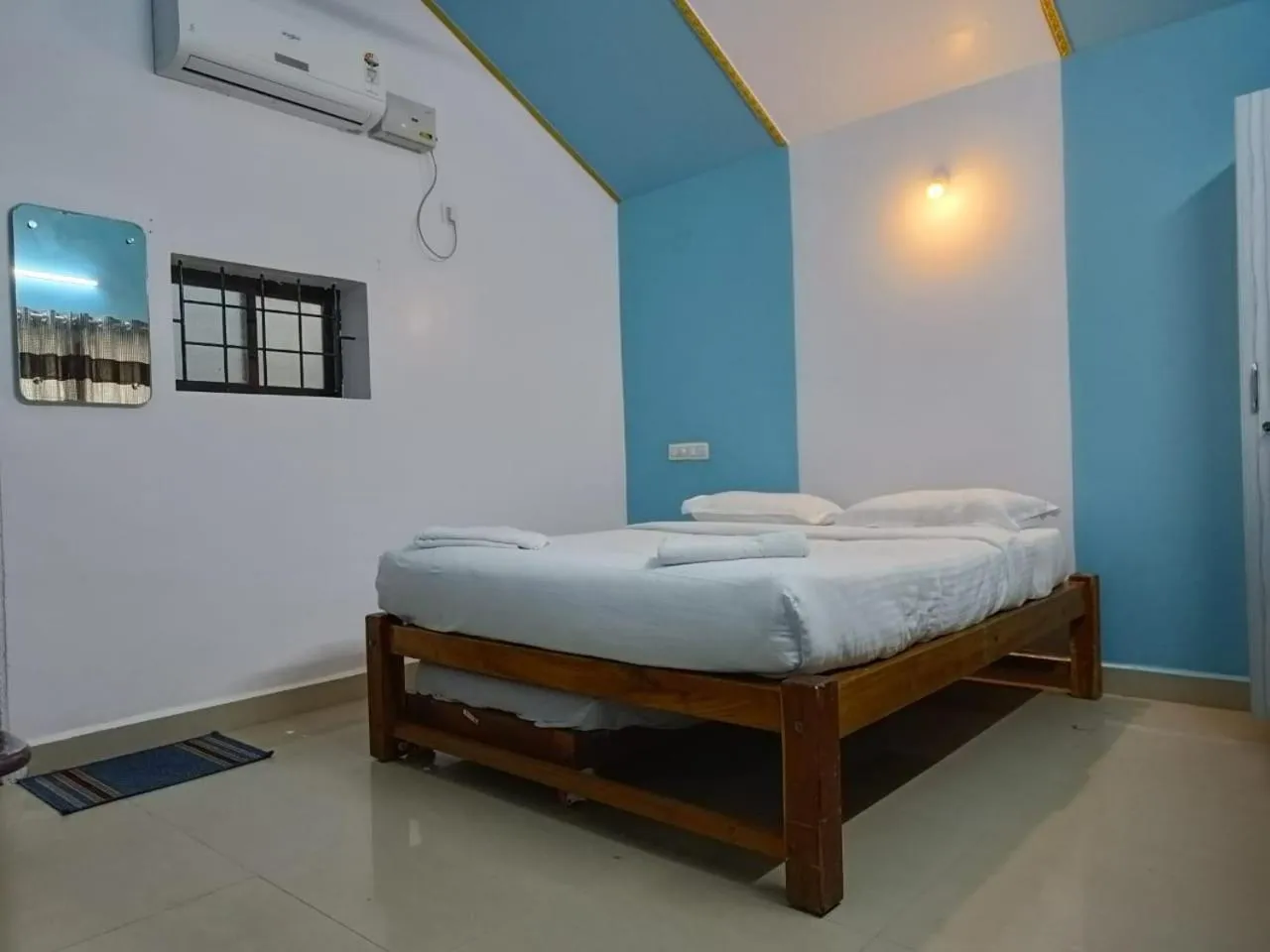 Bed in Poornima Beach Stay