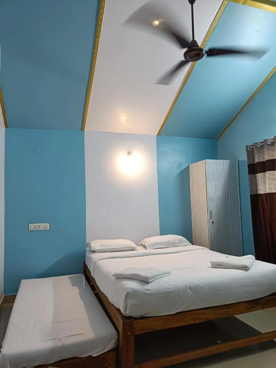 Bed in Poornima Beach Stay