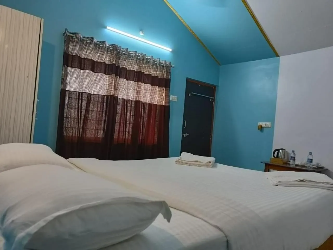 Bed in Poornima Beach Stay