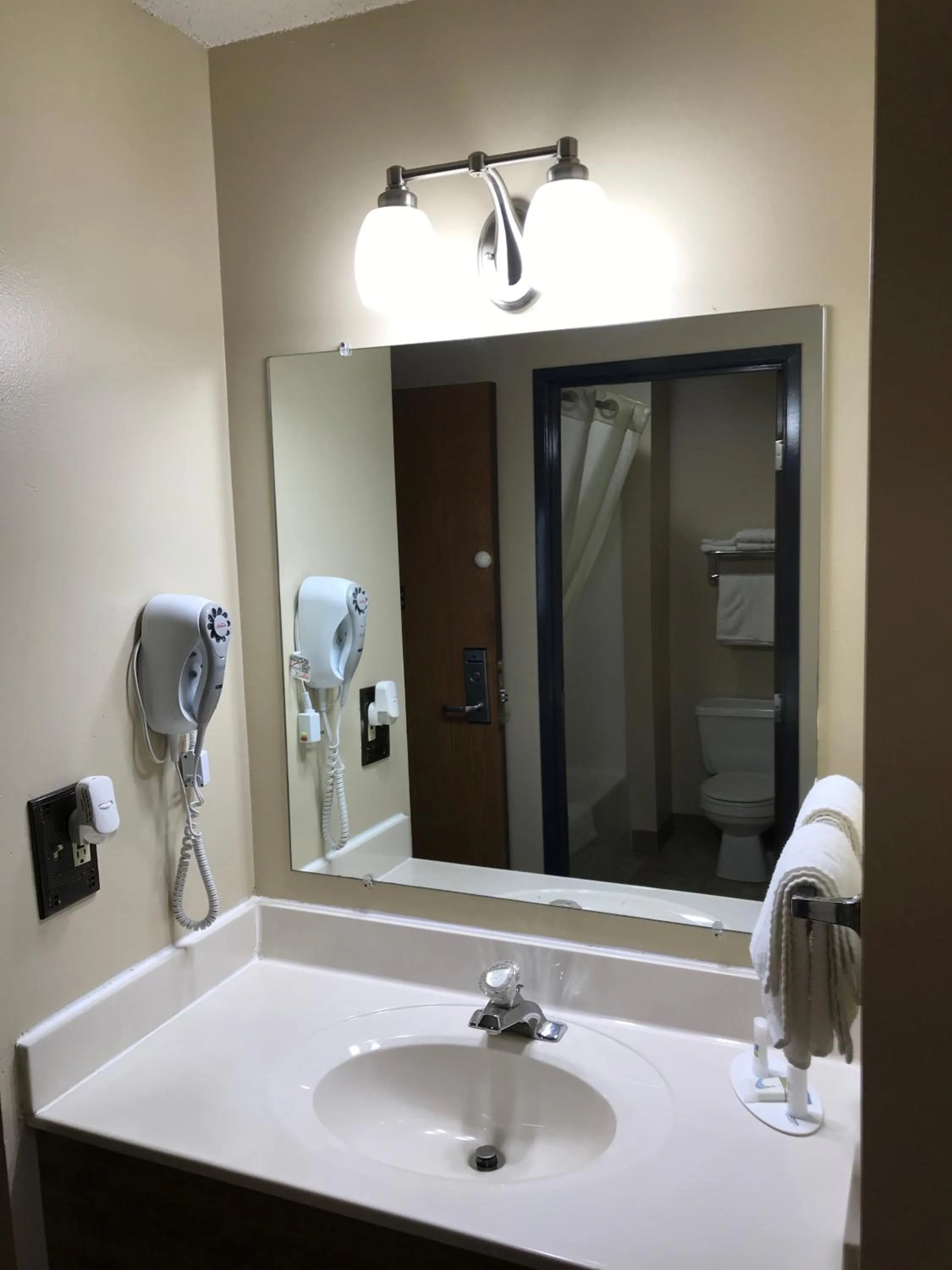 Bathroom in Heartland Hotel & Suites
