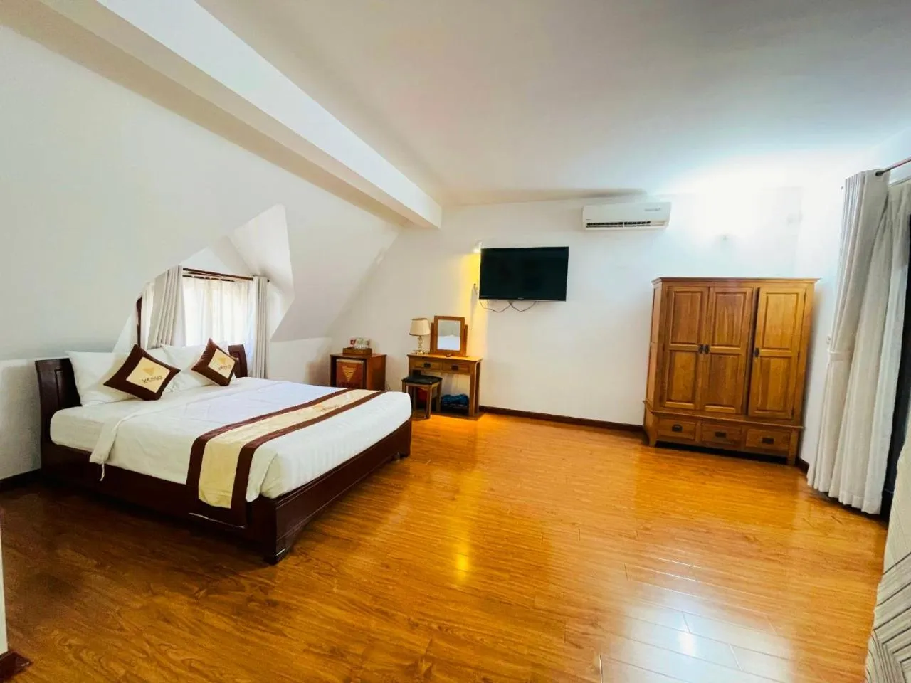 Bed in Venus Phu Quoc Hotel