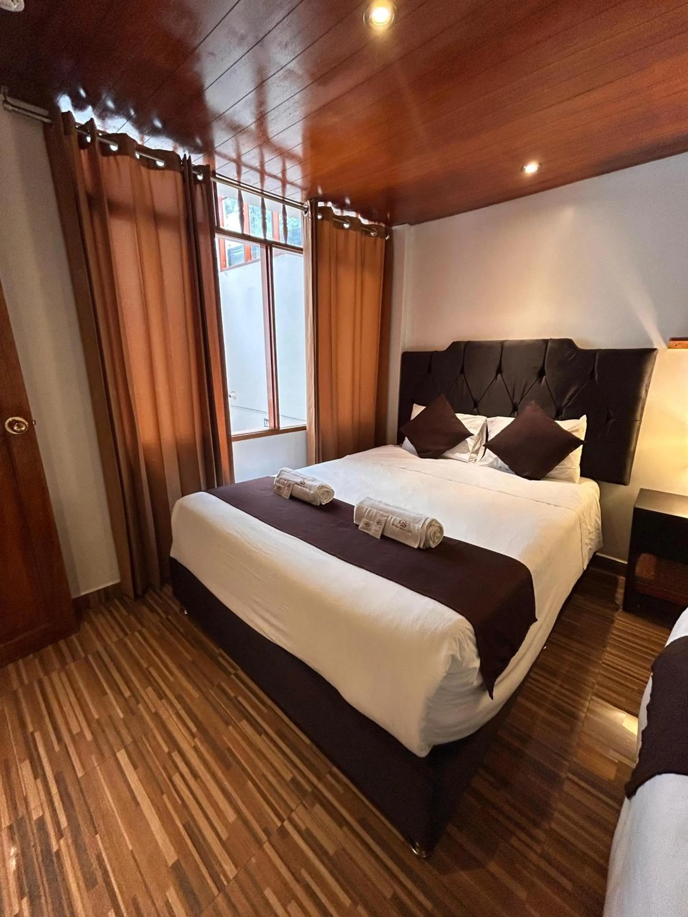 Bed in SAYACMARCA CLASSIC Inn