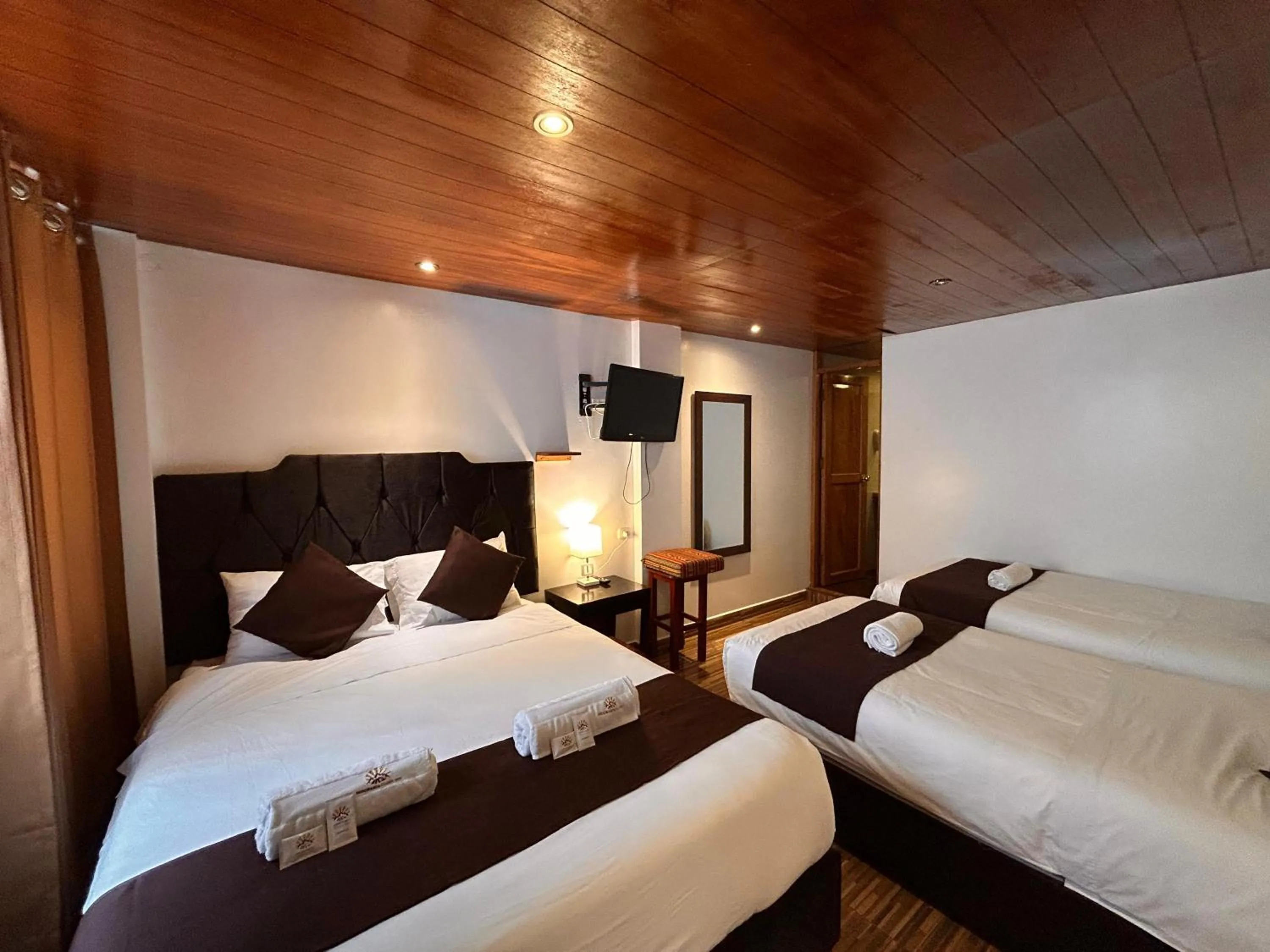 Bed in SAYACMARCA CLASSIC Inn