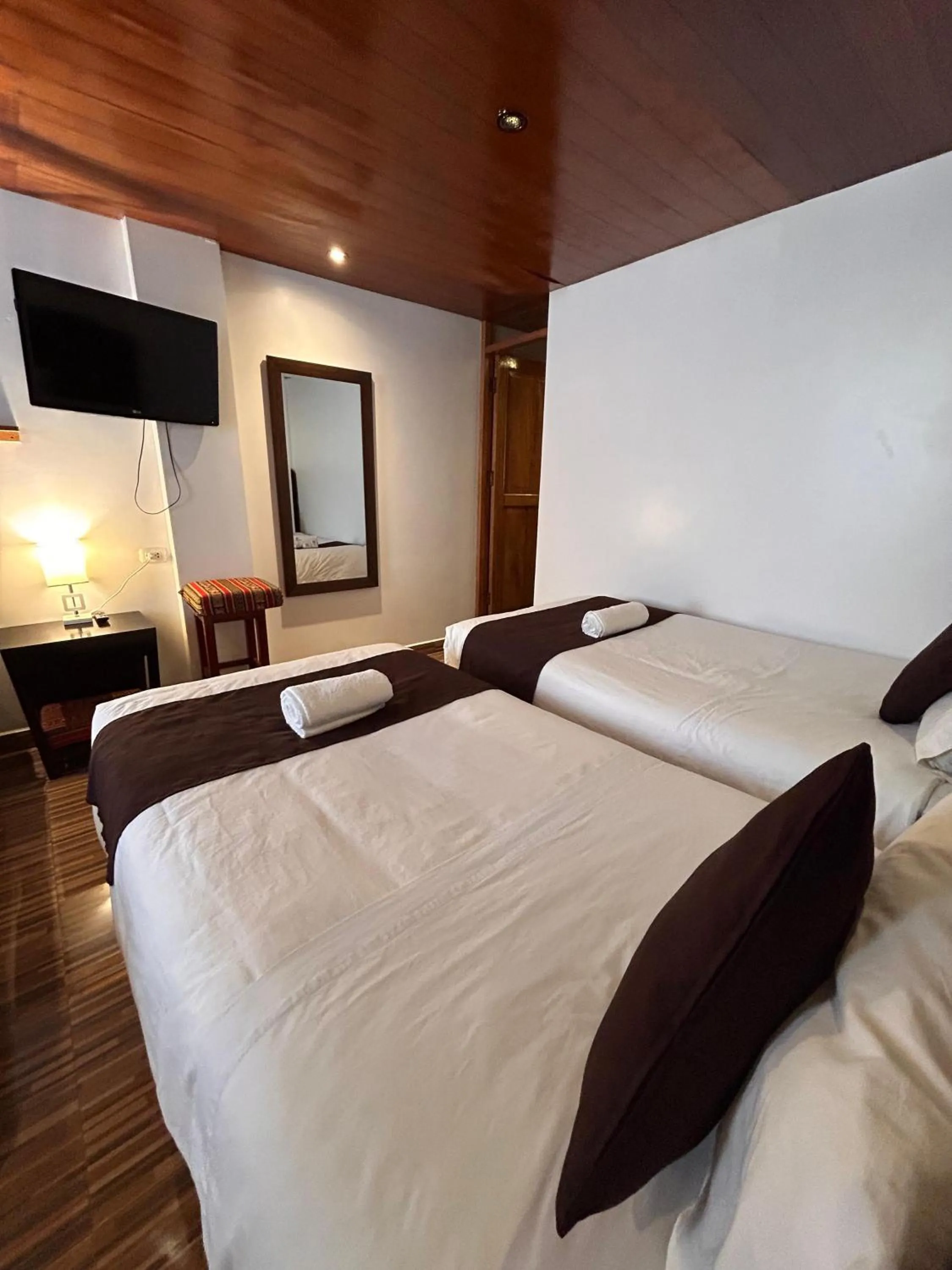 Bed in SAYACMARCA CLASSIC Inn