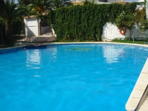 Swimming pool in Hotel Meson Fuente del Pino