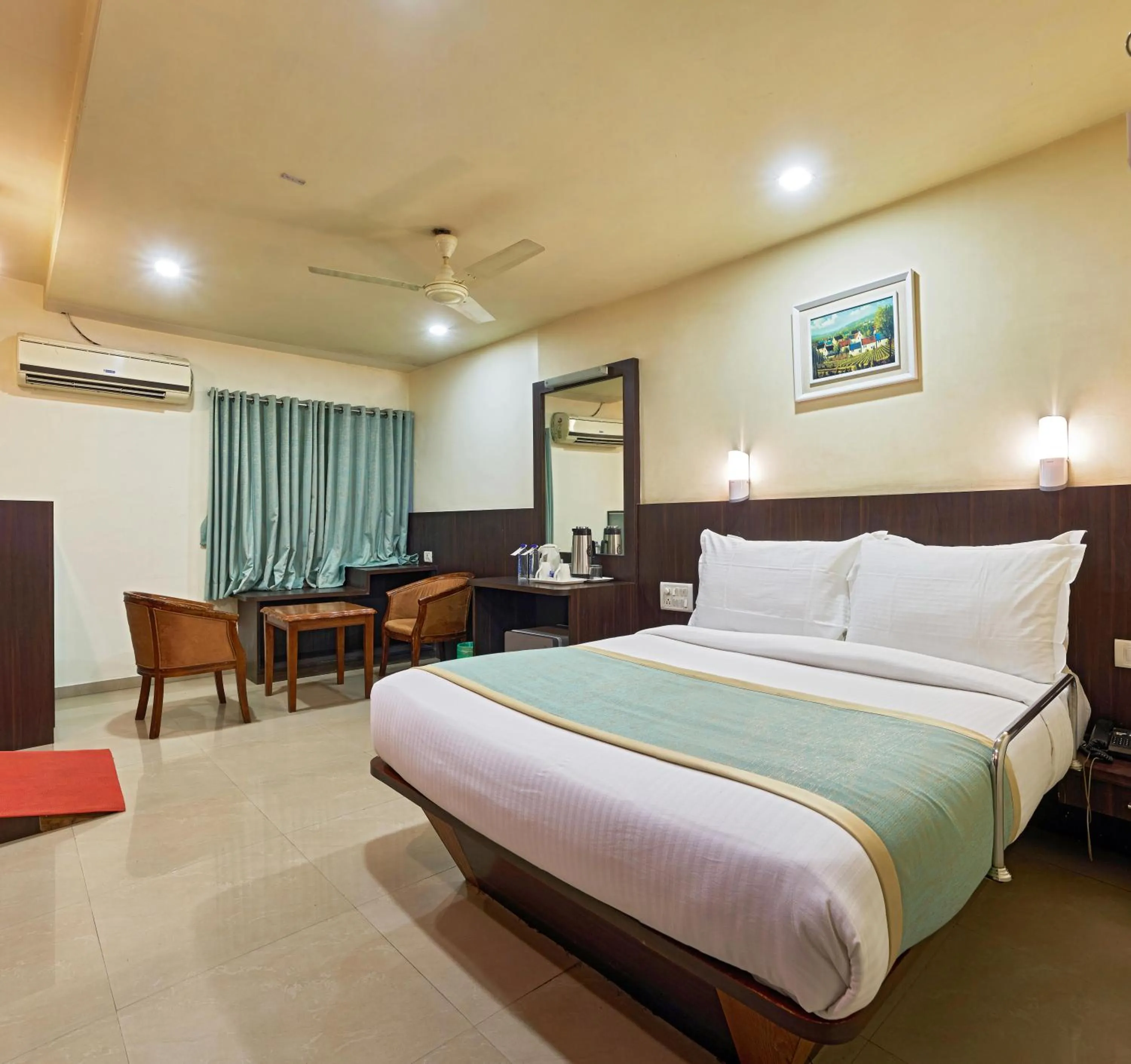 Photo of the whole room, Bed in Hotel Atria, Kolhapur