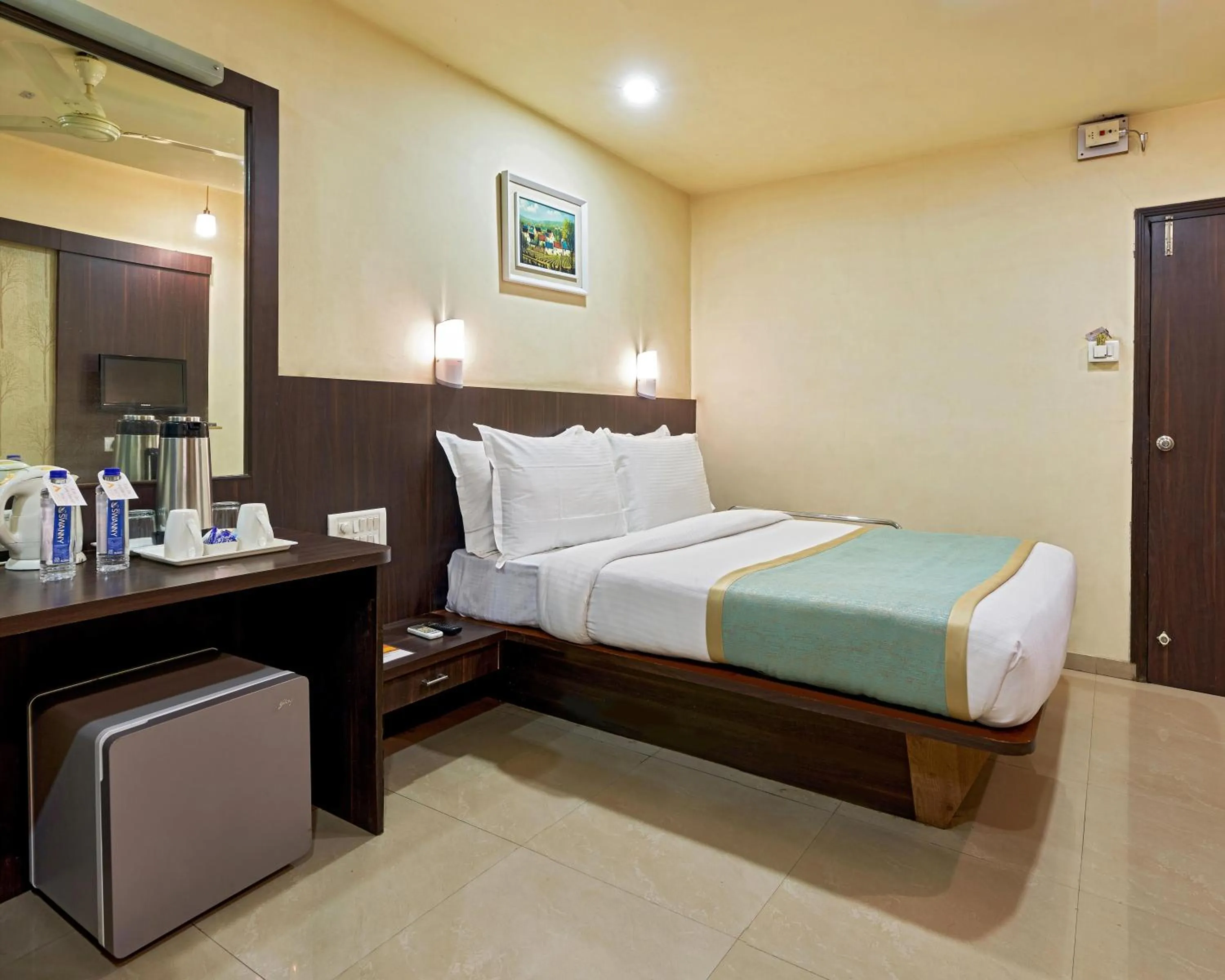Photo of the whole room, Bed in Hotel Atria, Kolhapur