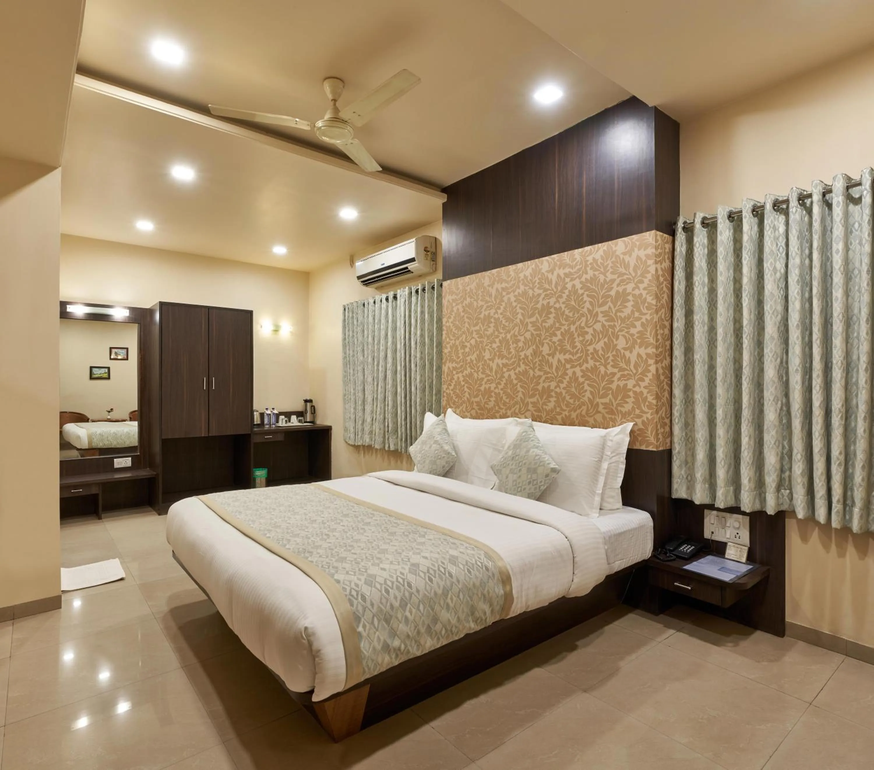 Photo of the whole room, Bed in Hotel Atria, Kolhapur
