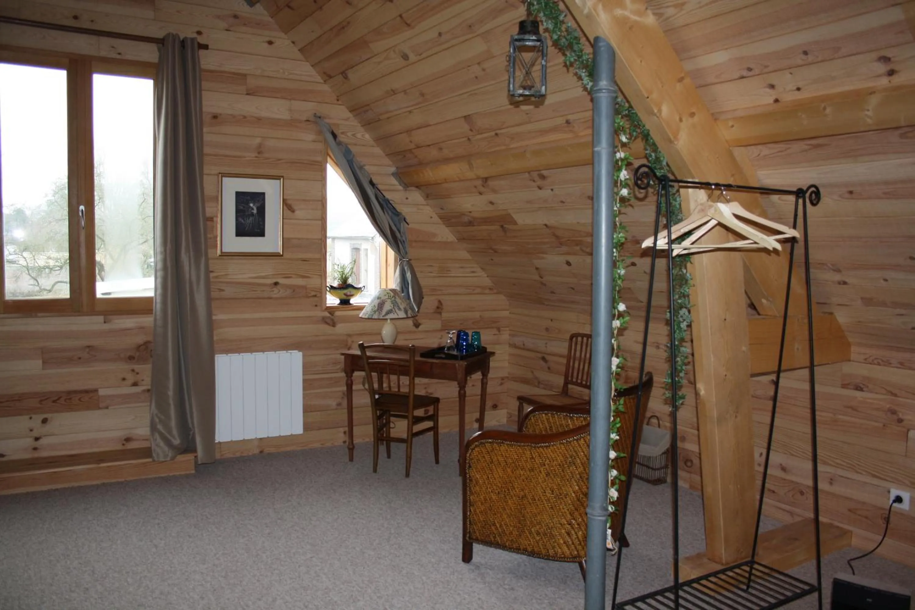 Seating area in Chambre d'hôtes - Le jardin des Patissons