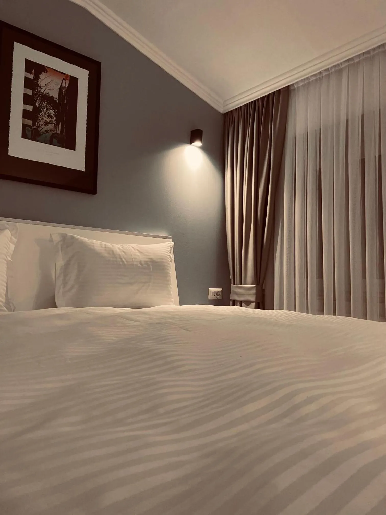 Bed in Hotel Callisto