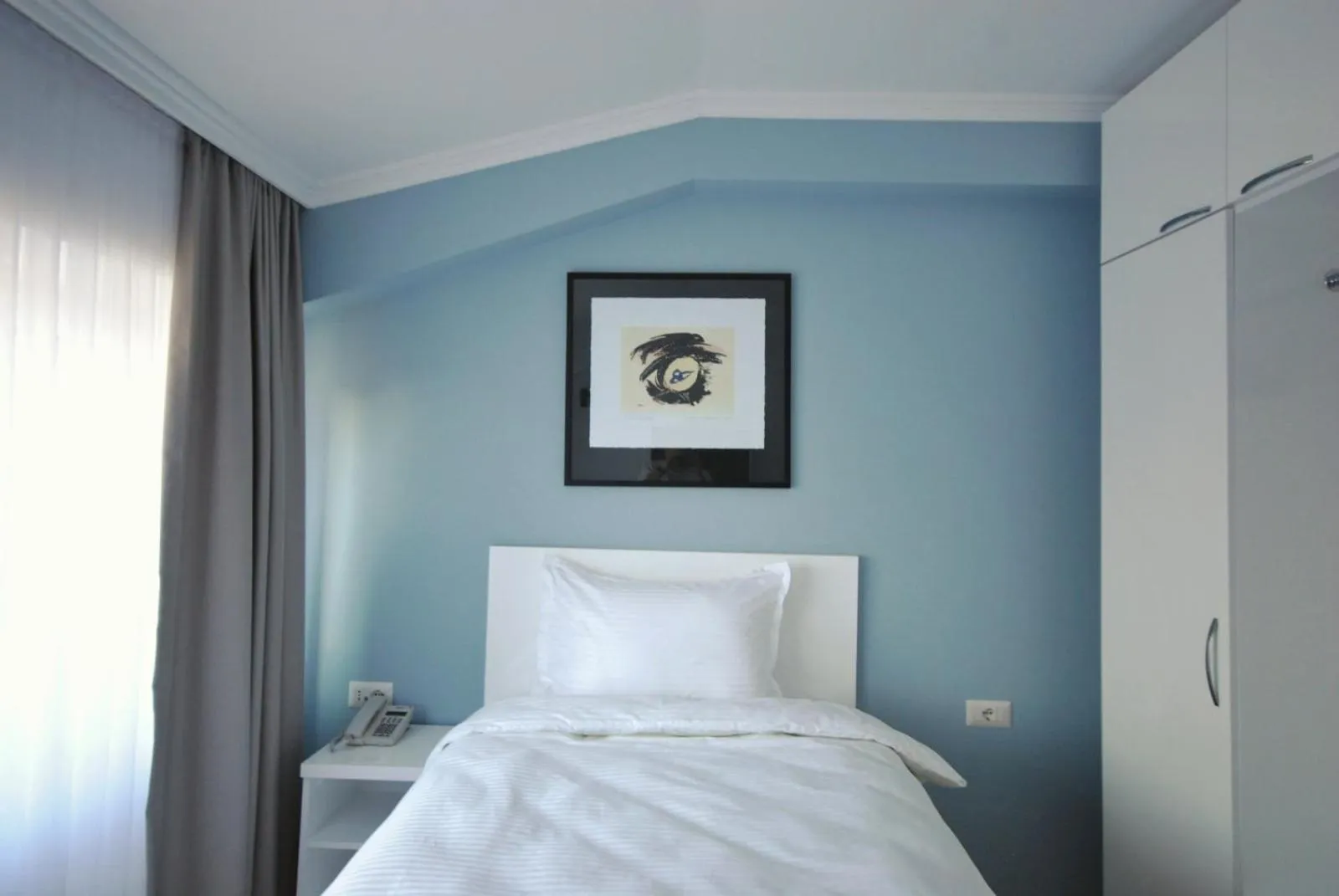 Bed in Hotel Callisto