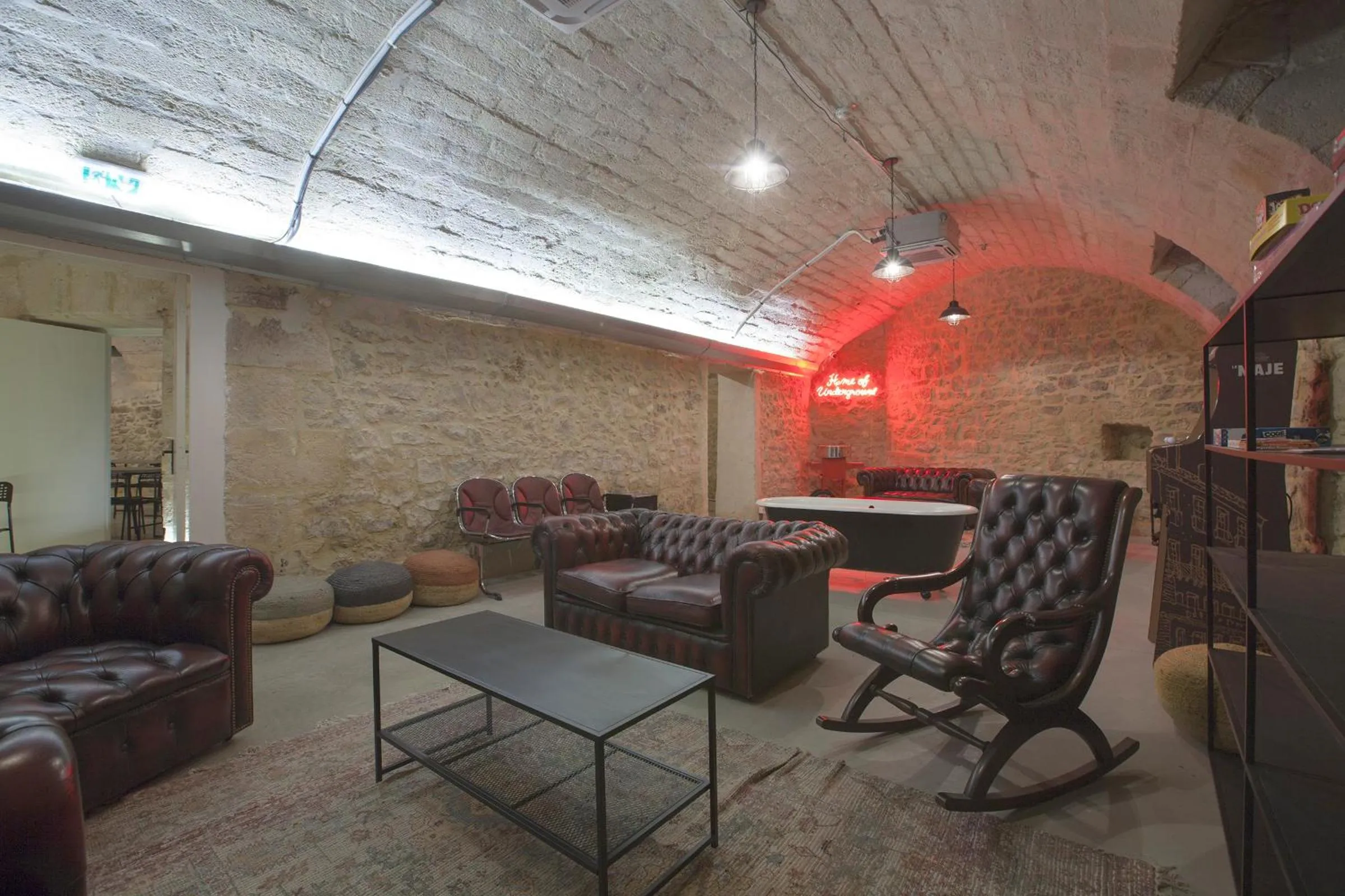 Communal lounge/ TV room in Le Maje Hostel