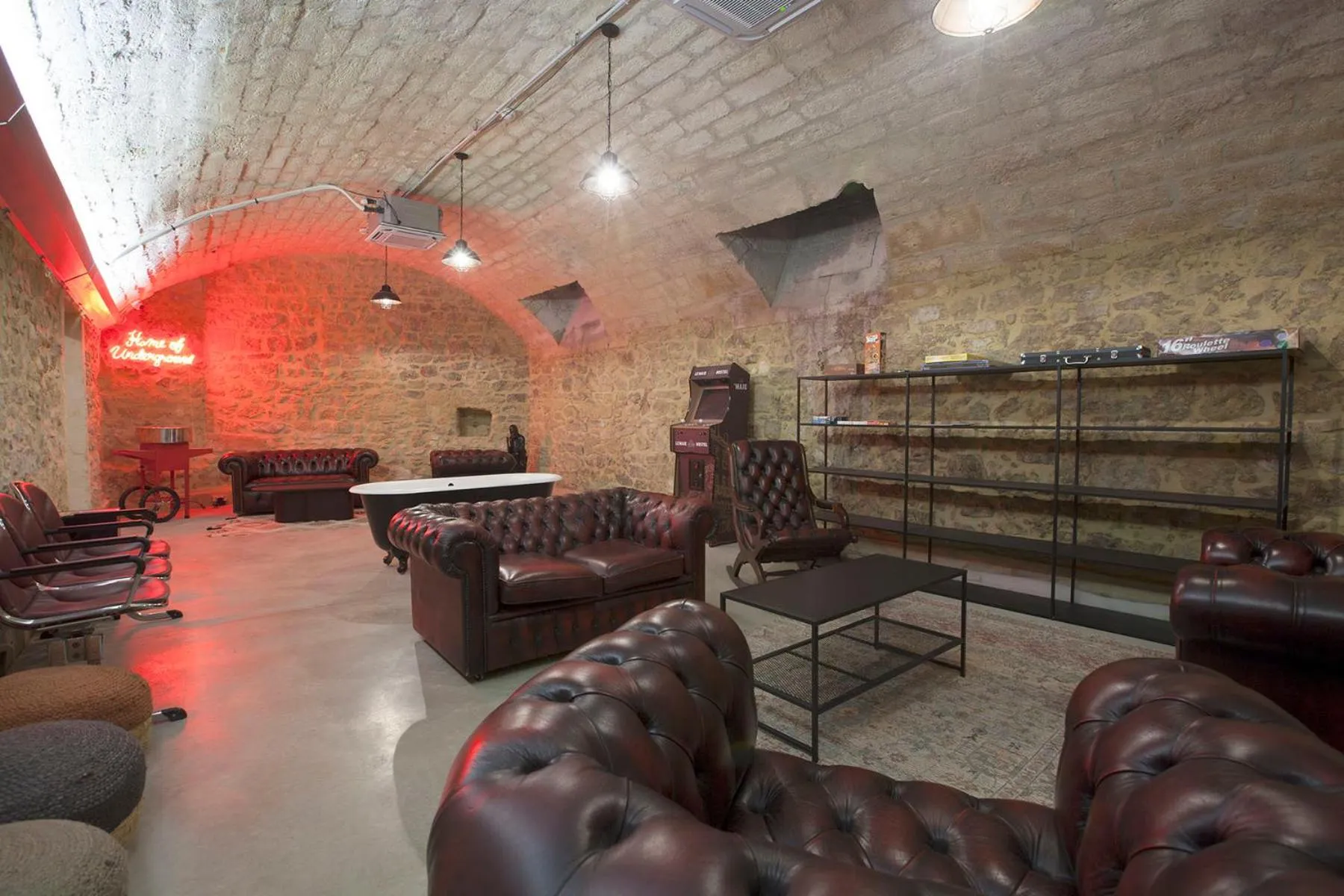 Communal lounge/ TV room in Le Maje Hostel