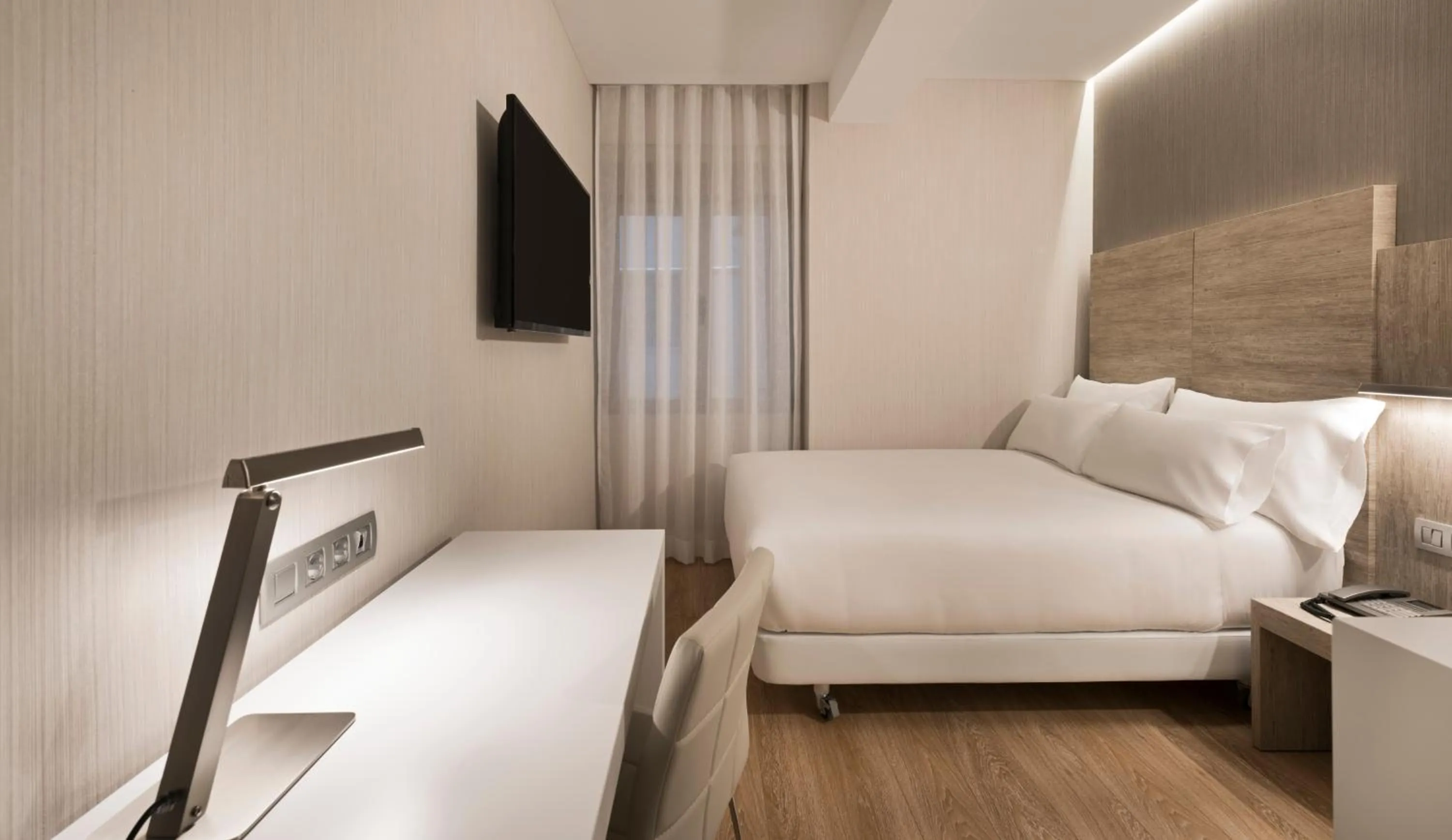 Bed in NH Madrid Chamberí